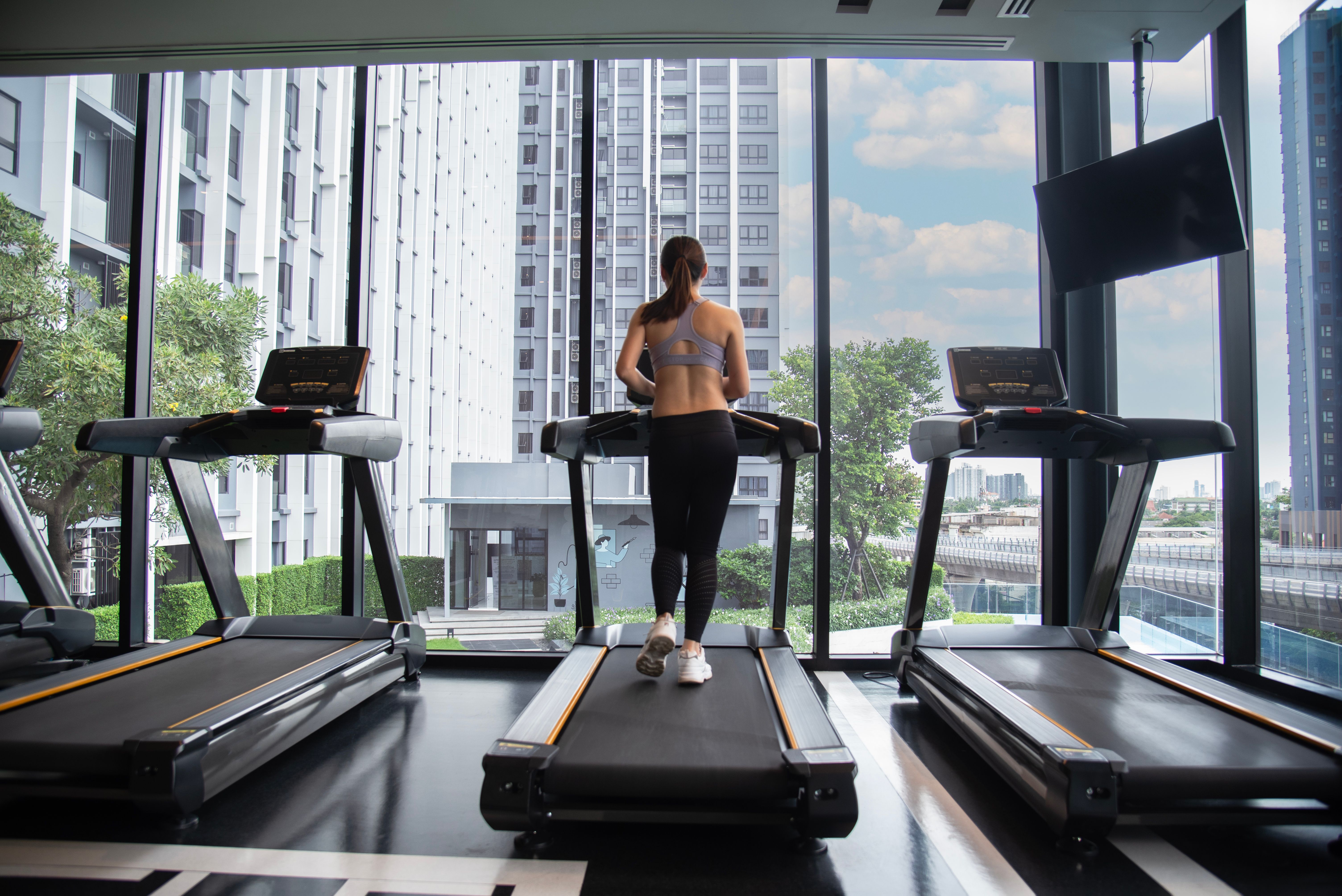 Asian woman exercise in the gym. Healthy and Lifestyle Concept. Asian woman exercise in the gym. Healthy and Lifestyle Concept.