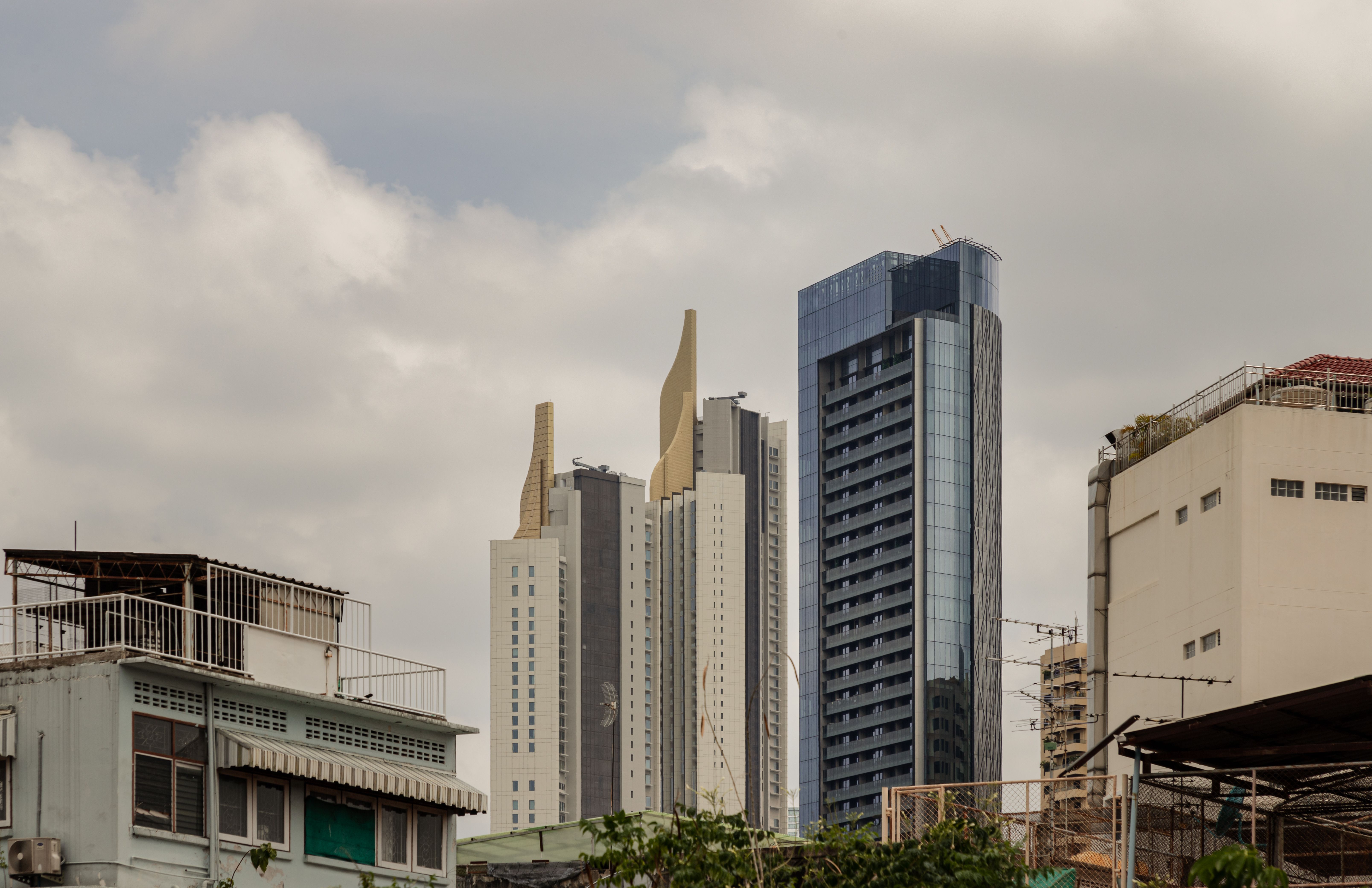 Modern architectural of Skyscrapers among with general buildings at City of Bangkok.