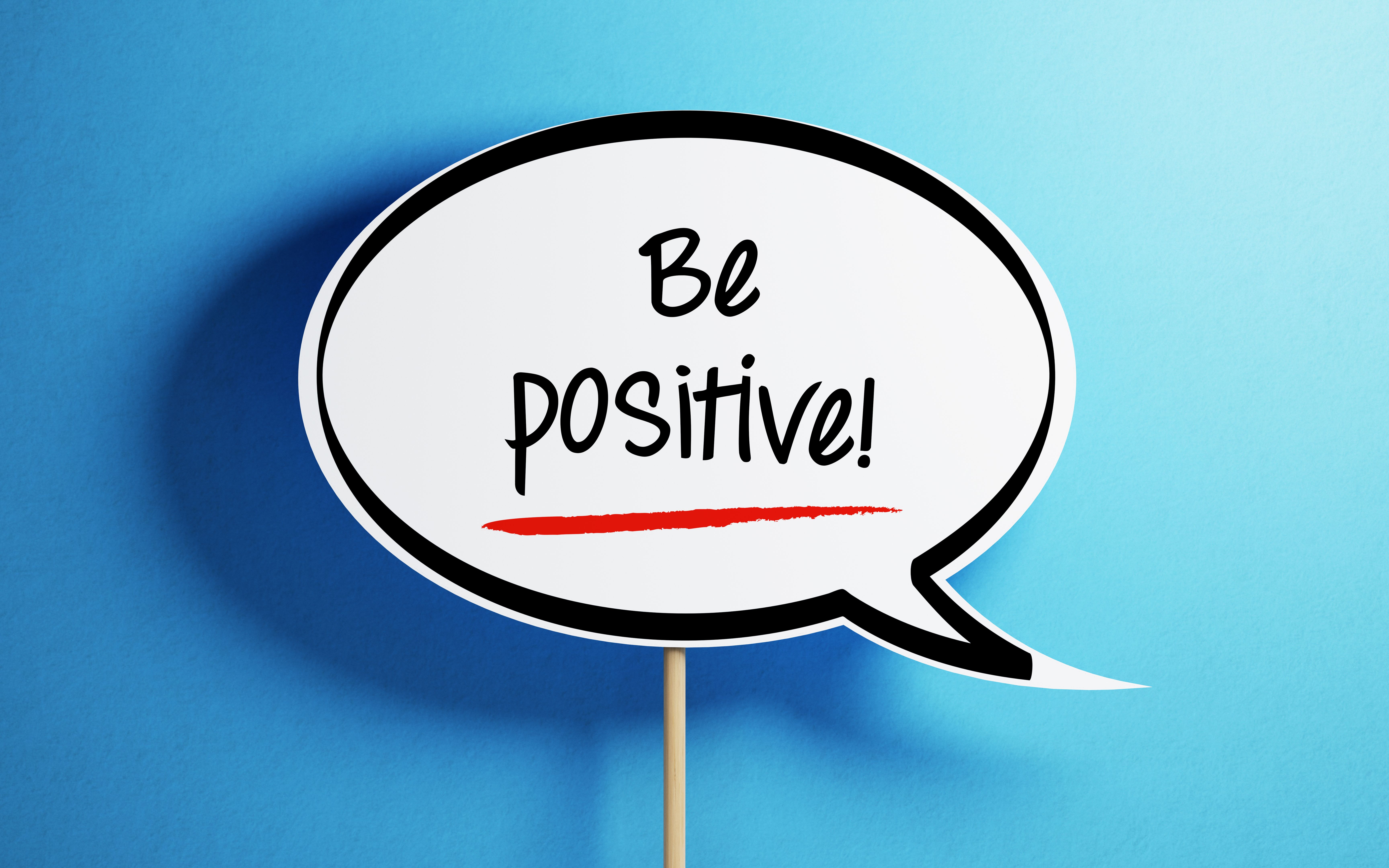 White Chat Bubble With Wooden Stick On Blue Background