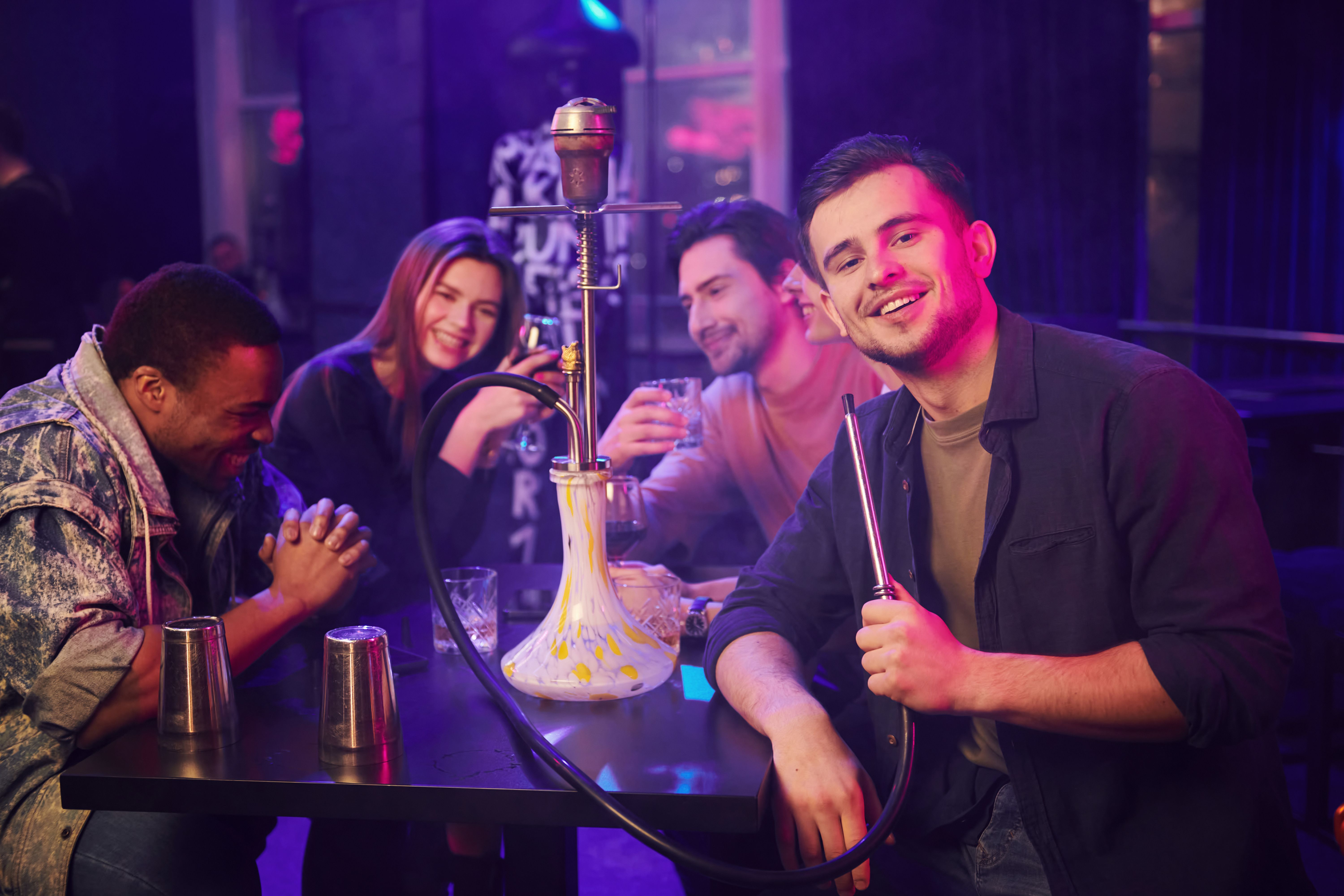 friends enjoying hookah