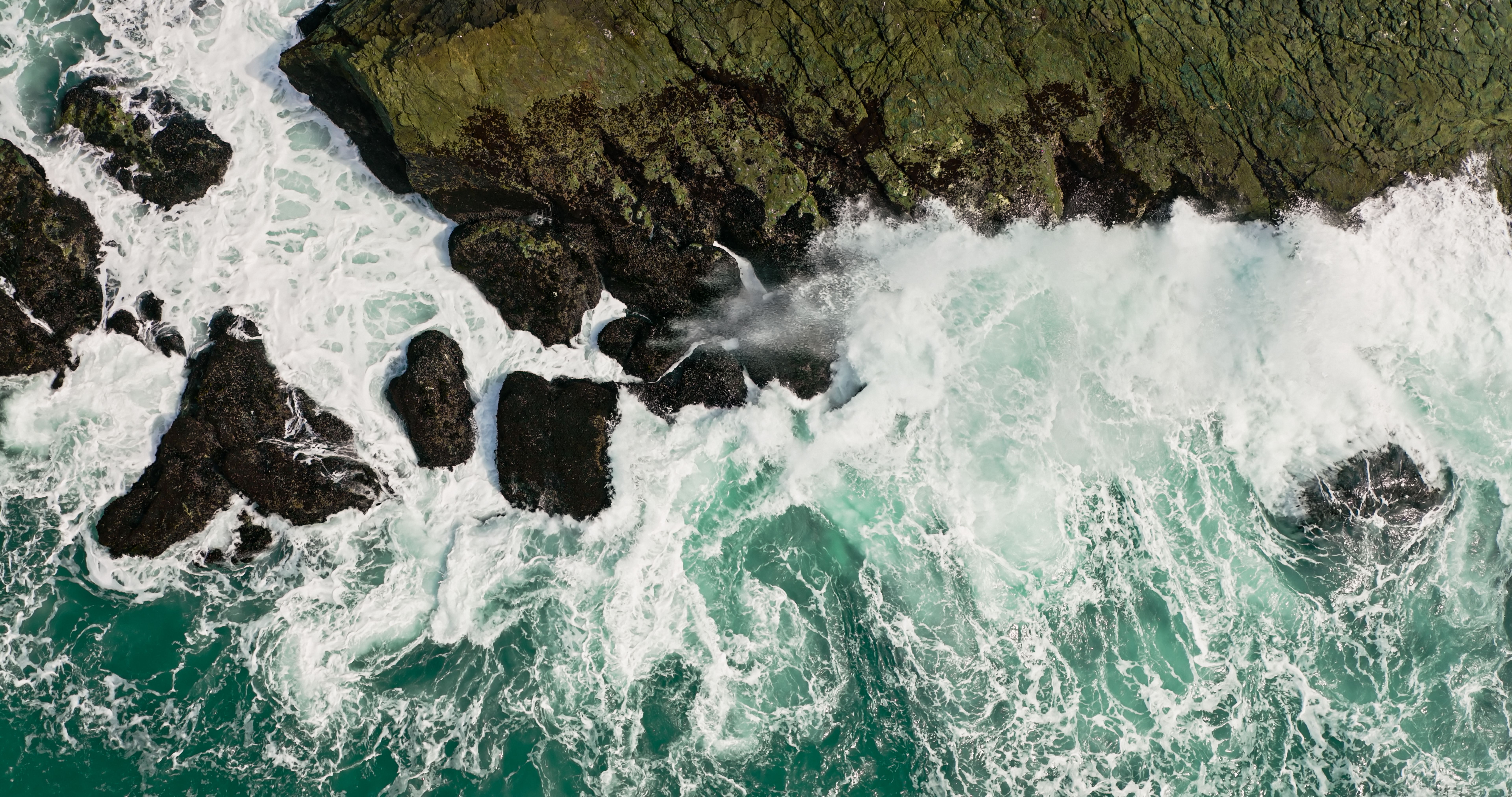 drone flying over ocean