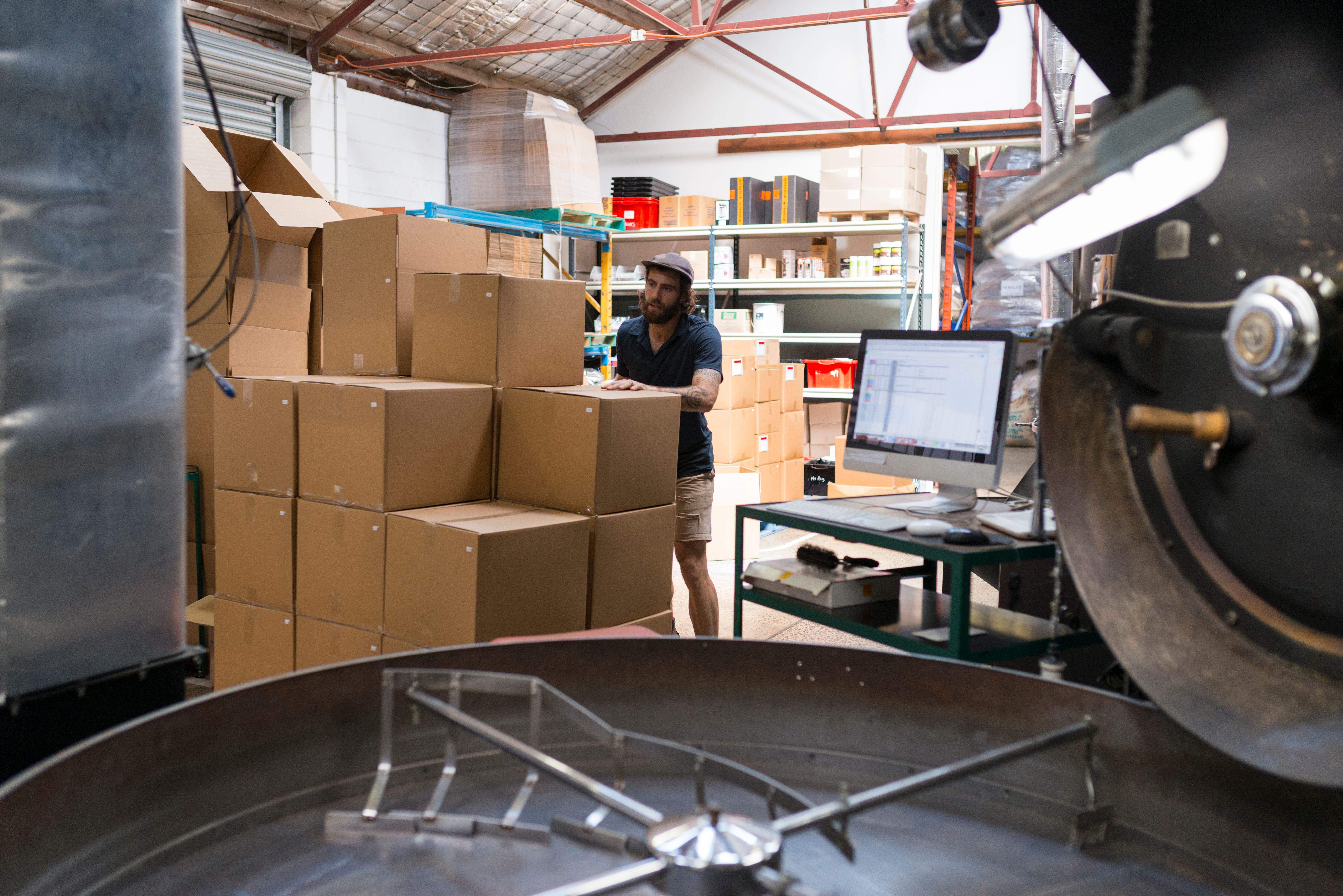 Man Working in Gourmet Coffee Roasting Factory