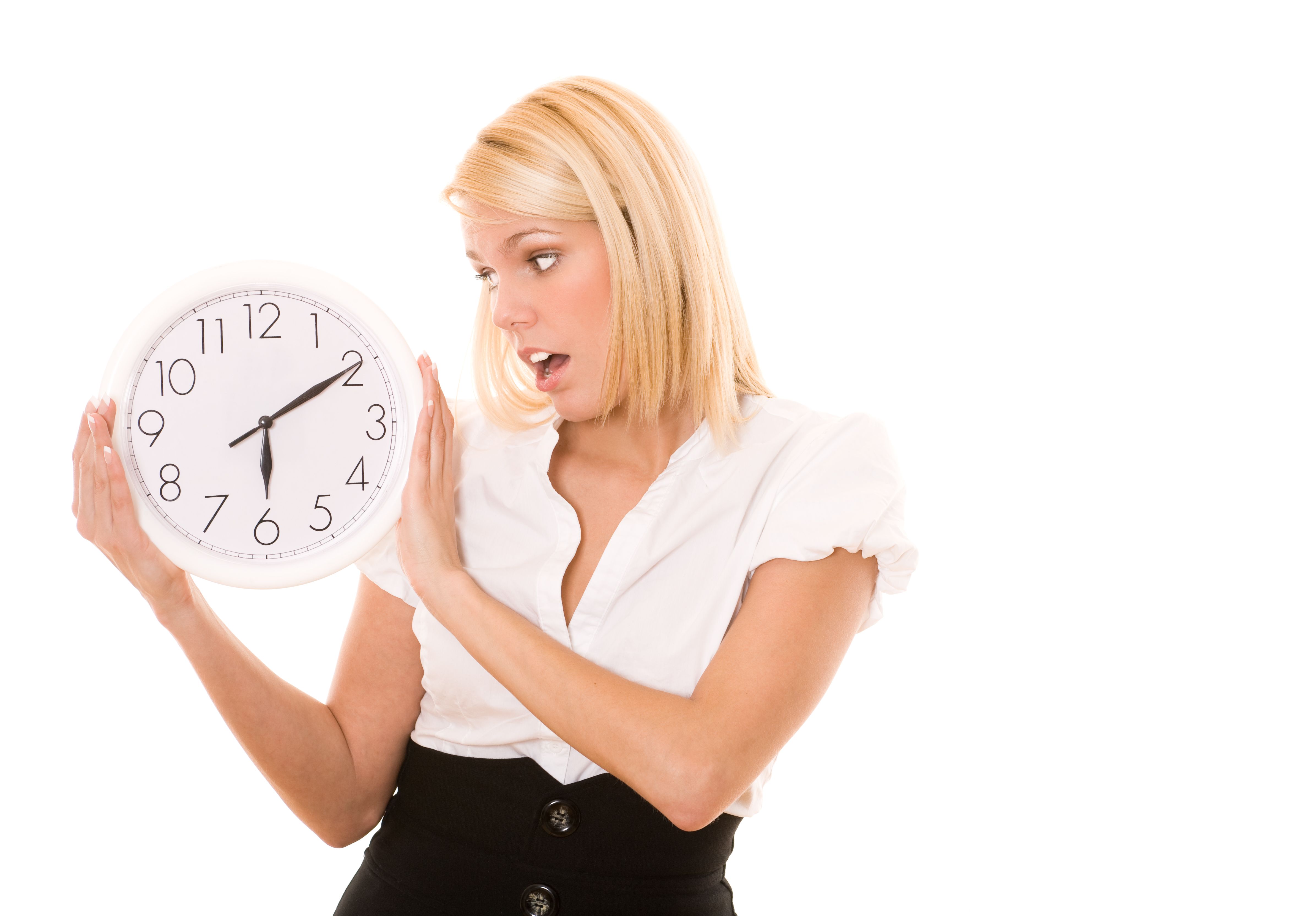 Businesswoman holding a clock