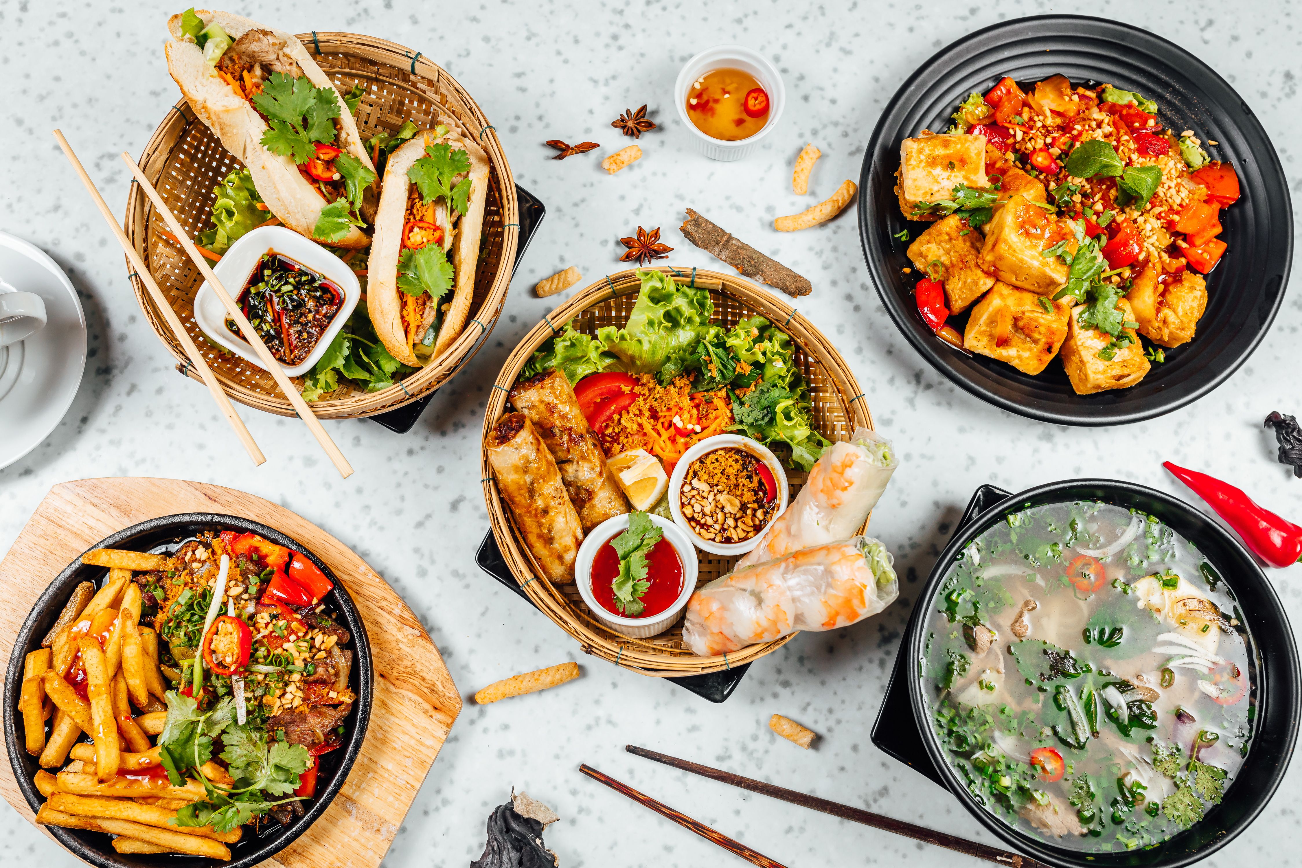 Top view of fresh and delicious Vietnamese food on a  table