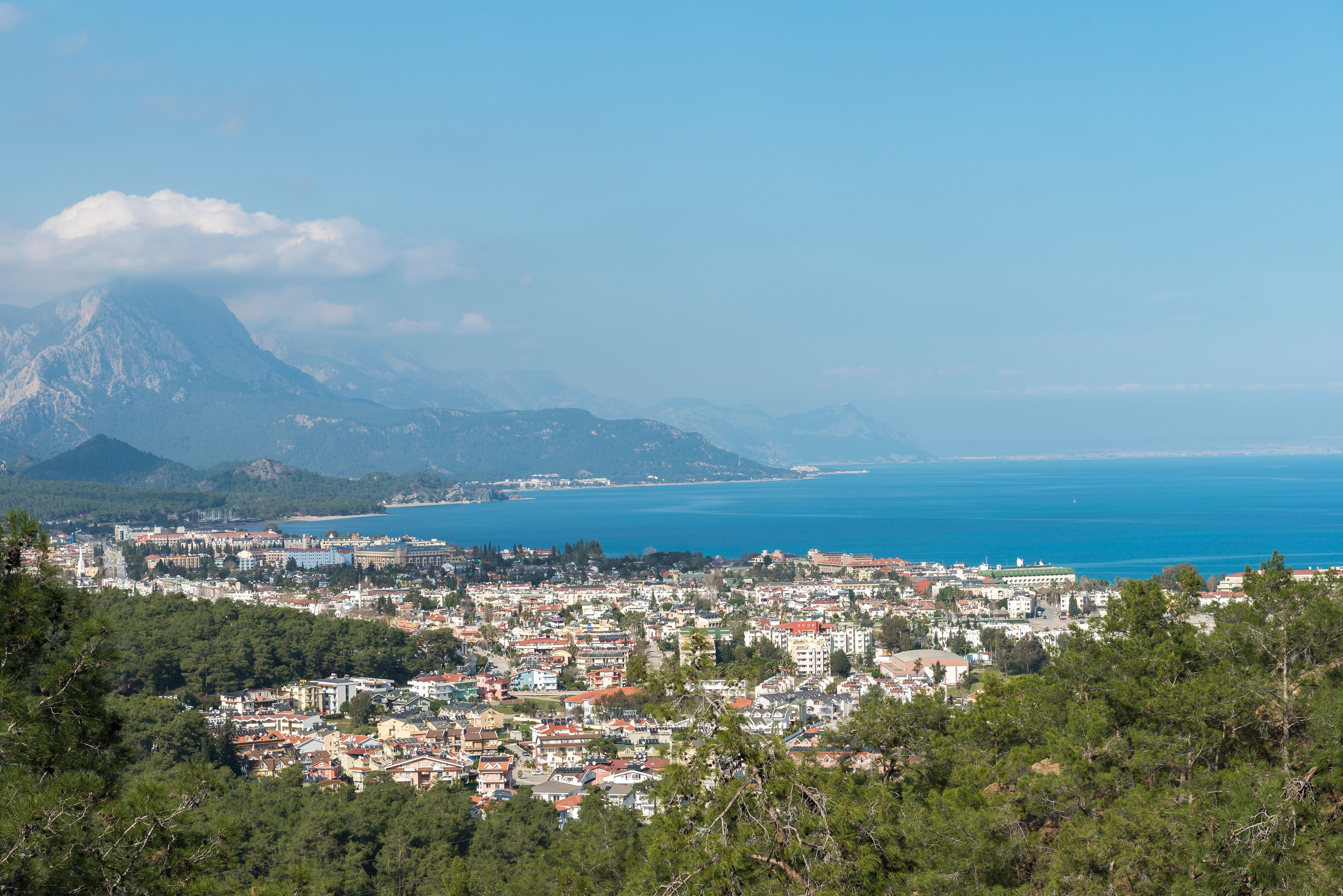 View of Kemer town on a coast of the Mediterranean sea in Antalya province, Turkey. Turkish Riviera. View from a mountain