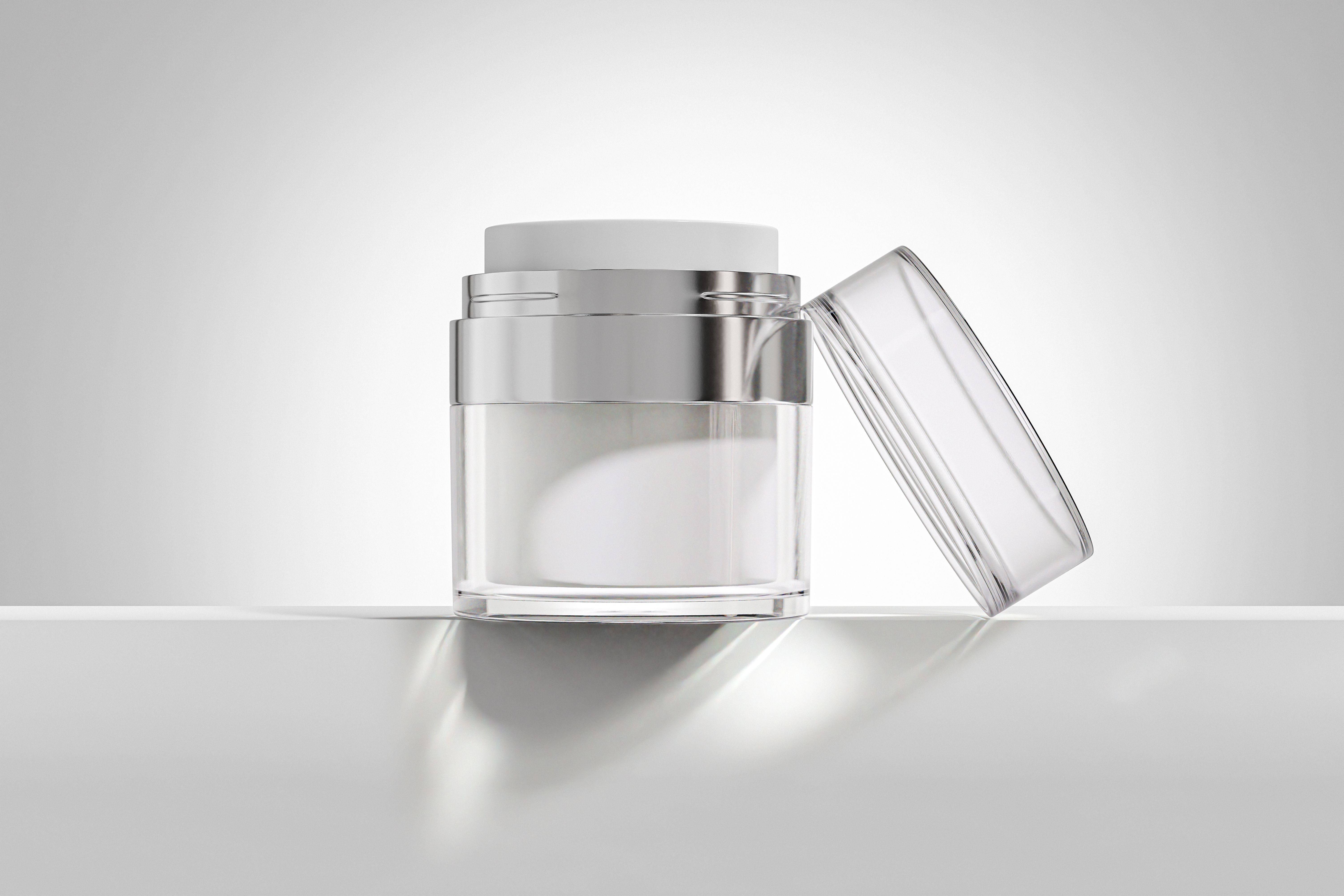 Airless cream jar mockup, anti-aging cream in vacuum bottle, luxury airless skincare packaging mockup, acrylic cosmetic jar with silver metallic texture, Double Walled refillable Cream container