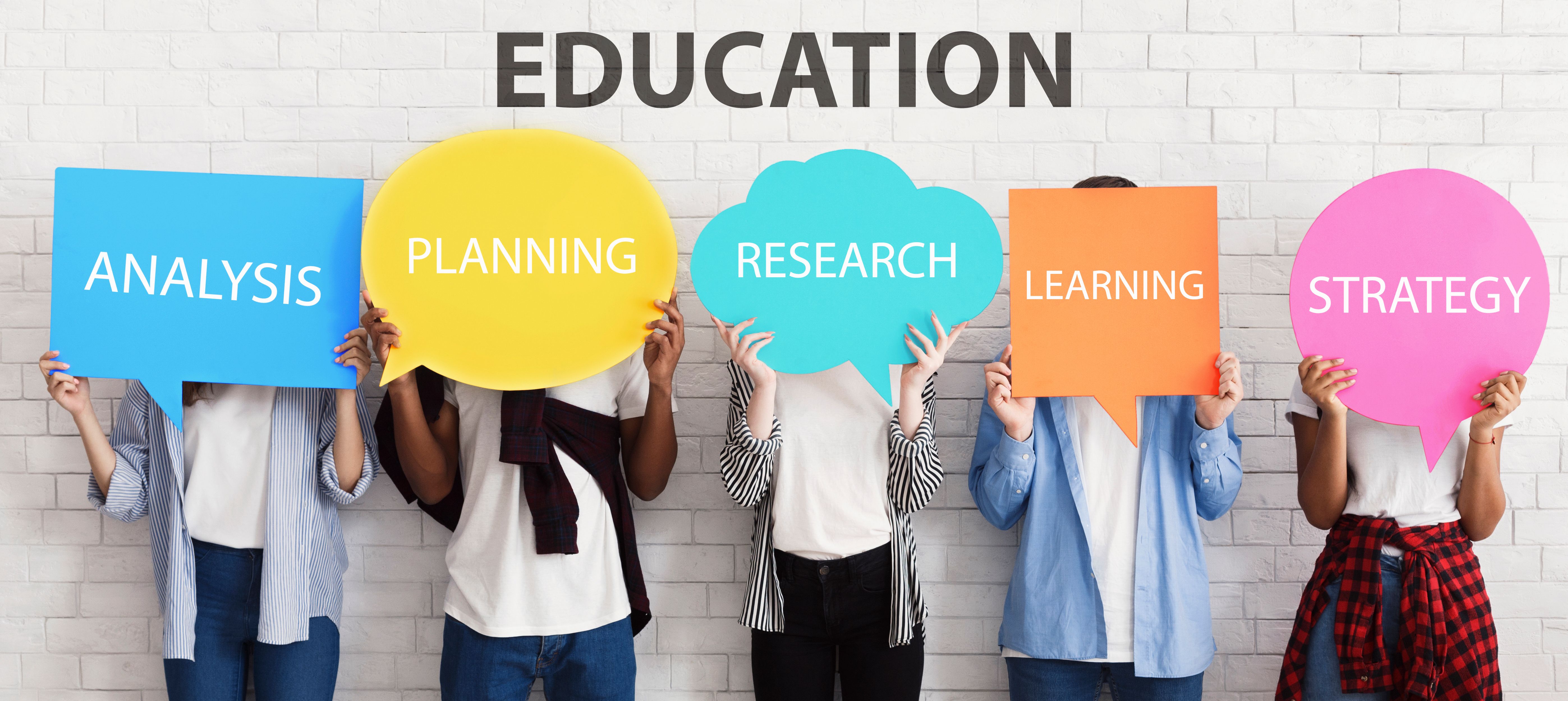 Teenagers covering faces with speech bubbles, successful education concept