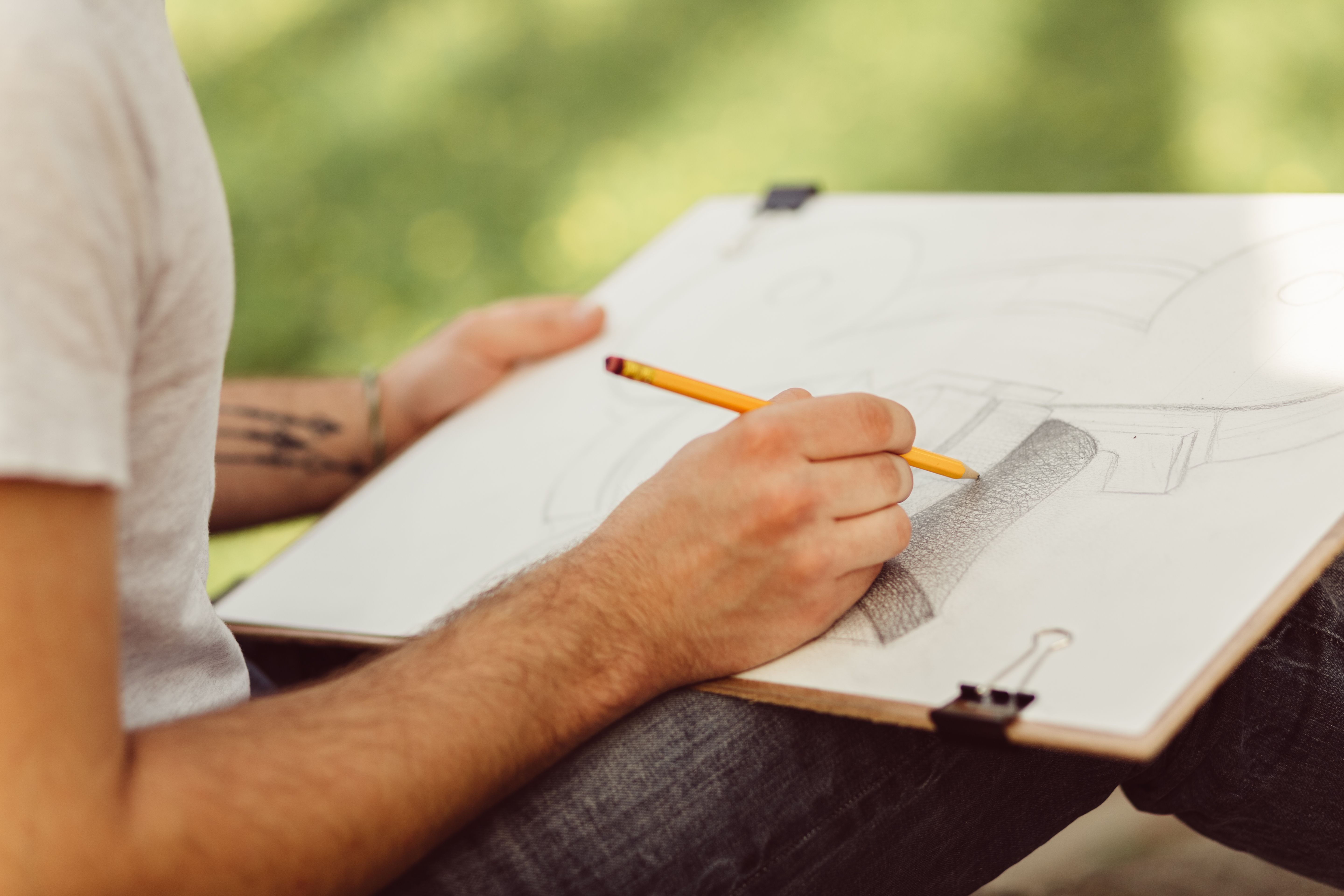 students painting outdoors