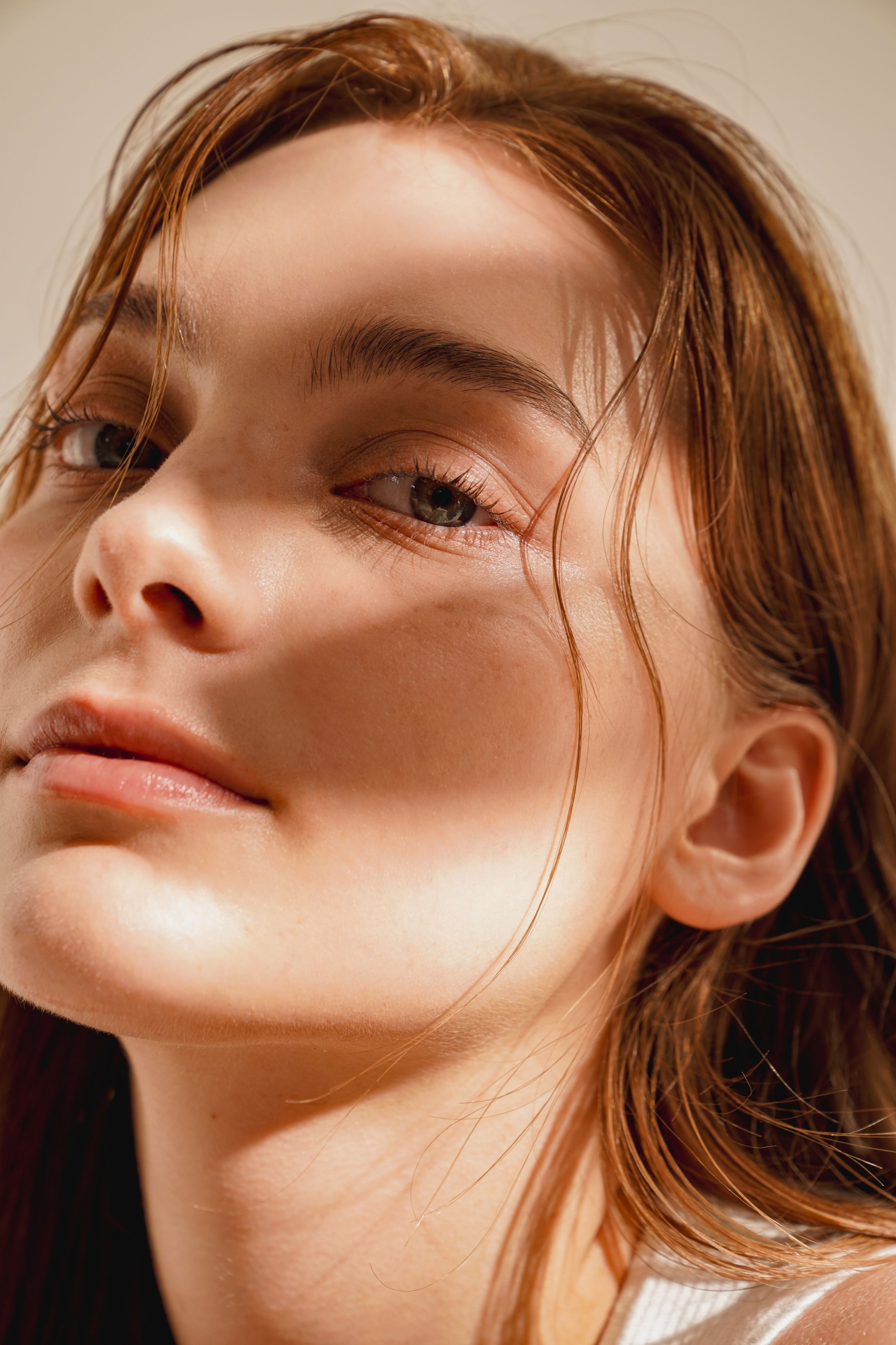 Natural beauty portrait of a young western woman shot in warm tones