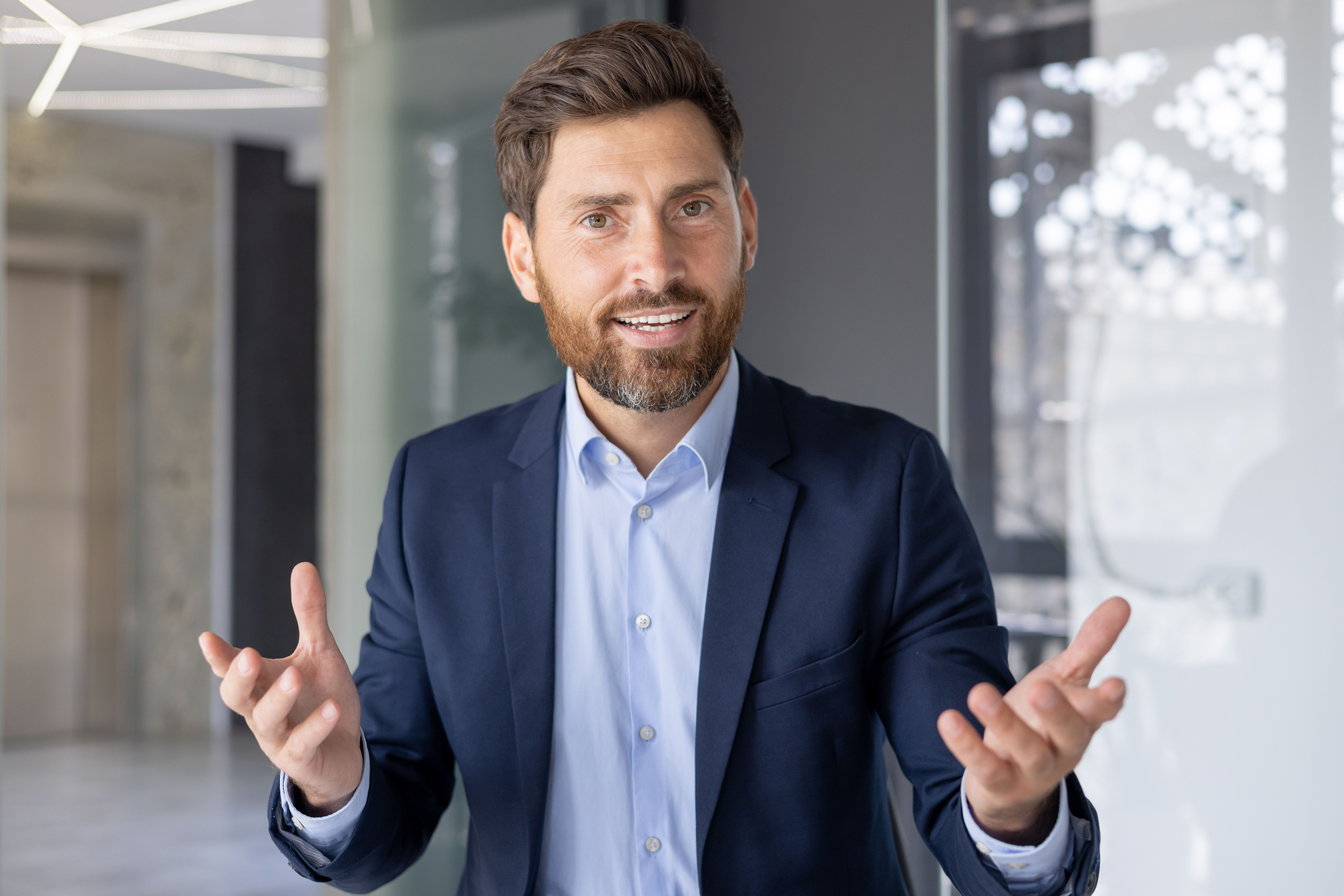 Businessman engaging in a video call with focused expression