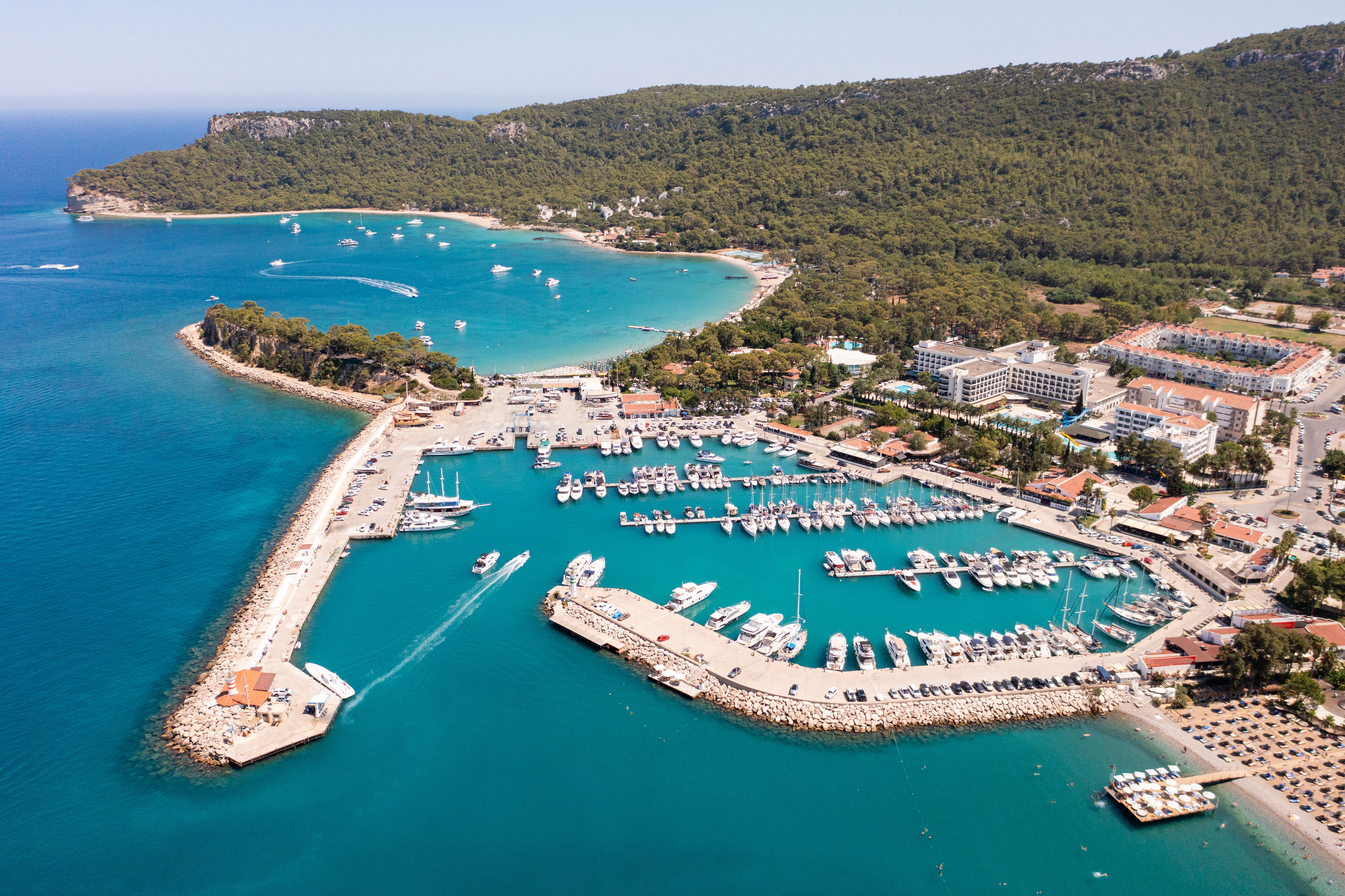Aerial view of the Kemer Marina and beach in Antalya. Aerial view of the Kemer Marina and beach in Antalya.