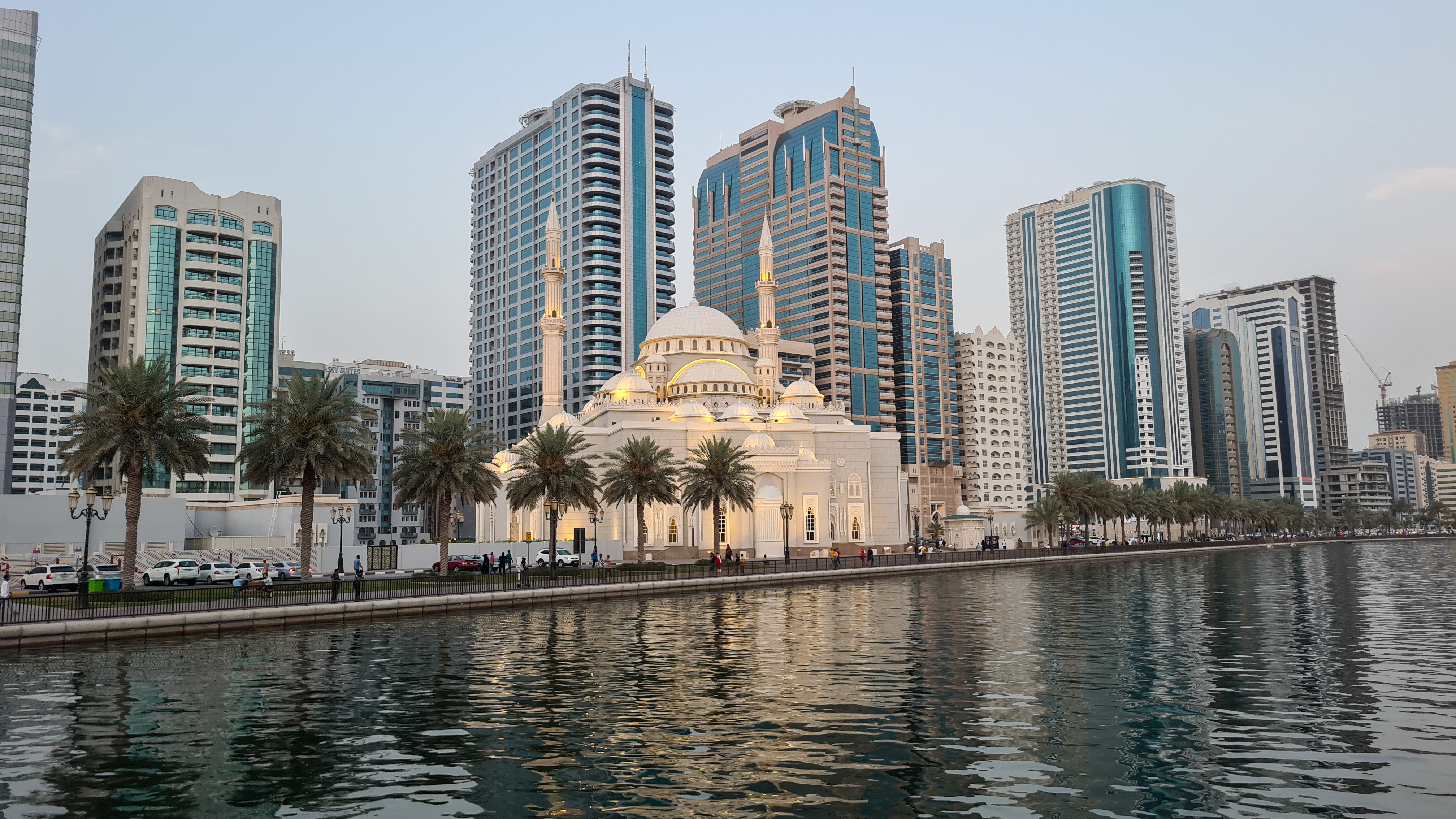 Skyline of Sharjah with skyscrapers and Al Noor Masjid from Al Noor Island