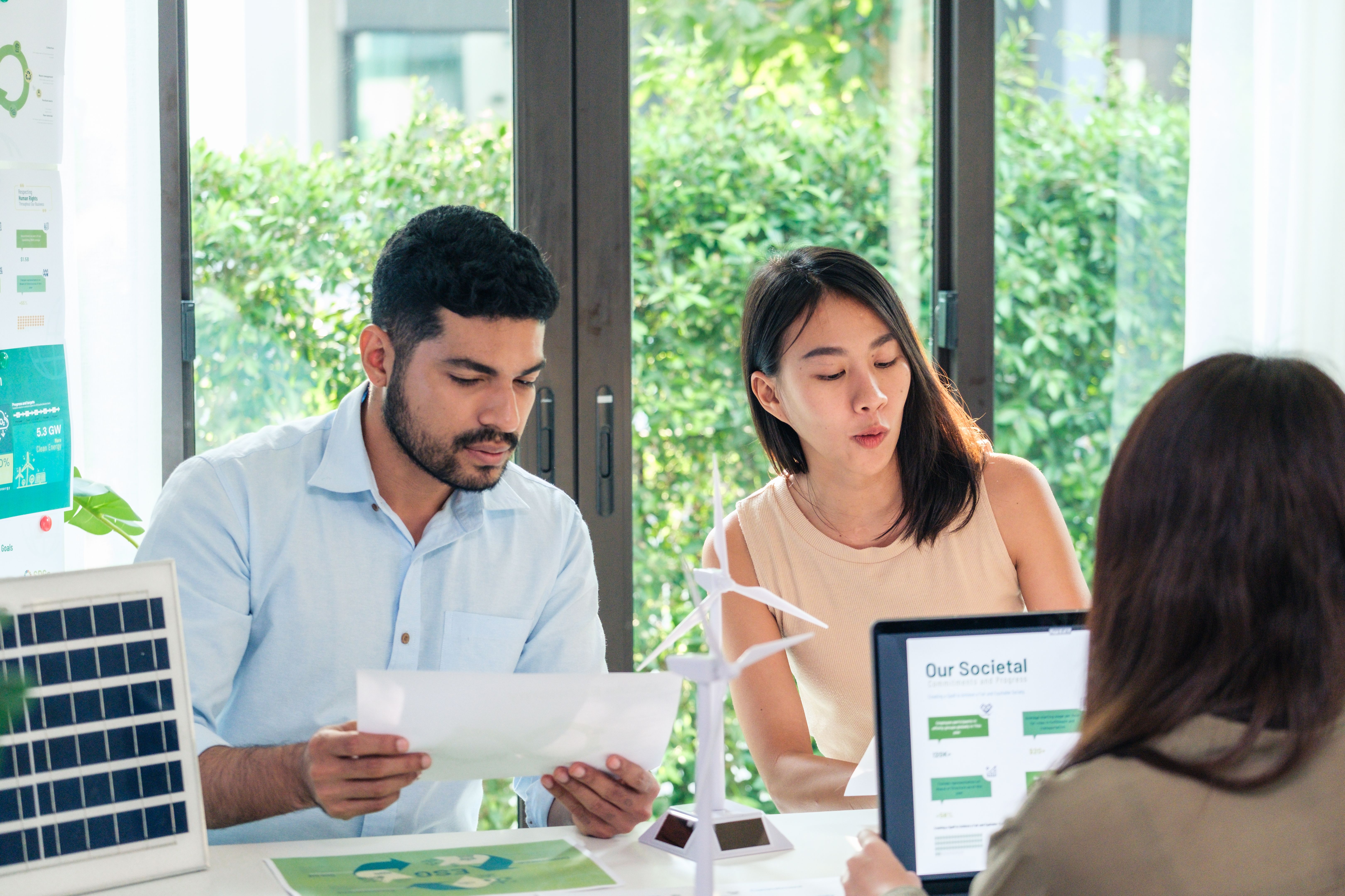 diversity team brainstorming discussion focused on ESG (environment,social,governance) for sdgs goals in a sustainable green office diversity team brainstorming discussion focused on ESG (environment,social,governance) for sdgs goals in a sustainable green office