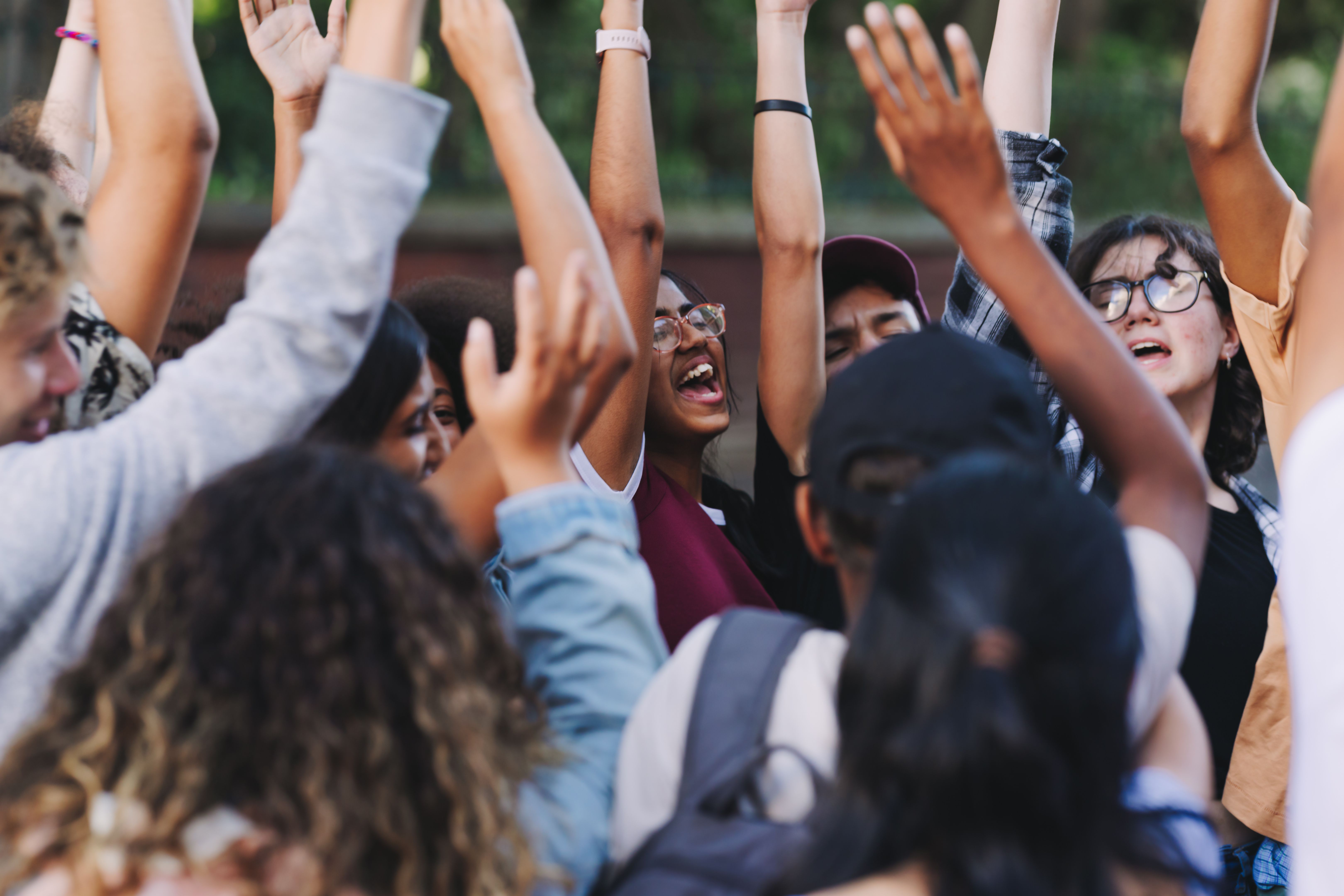 college students cheering