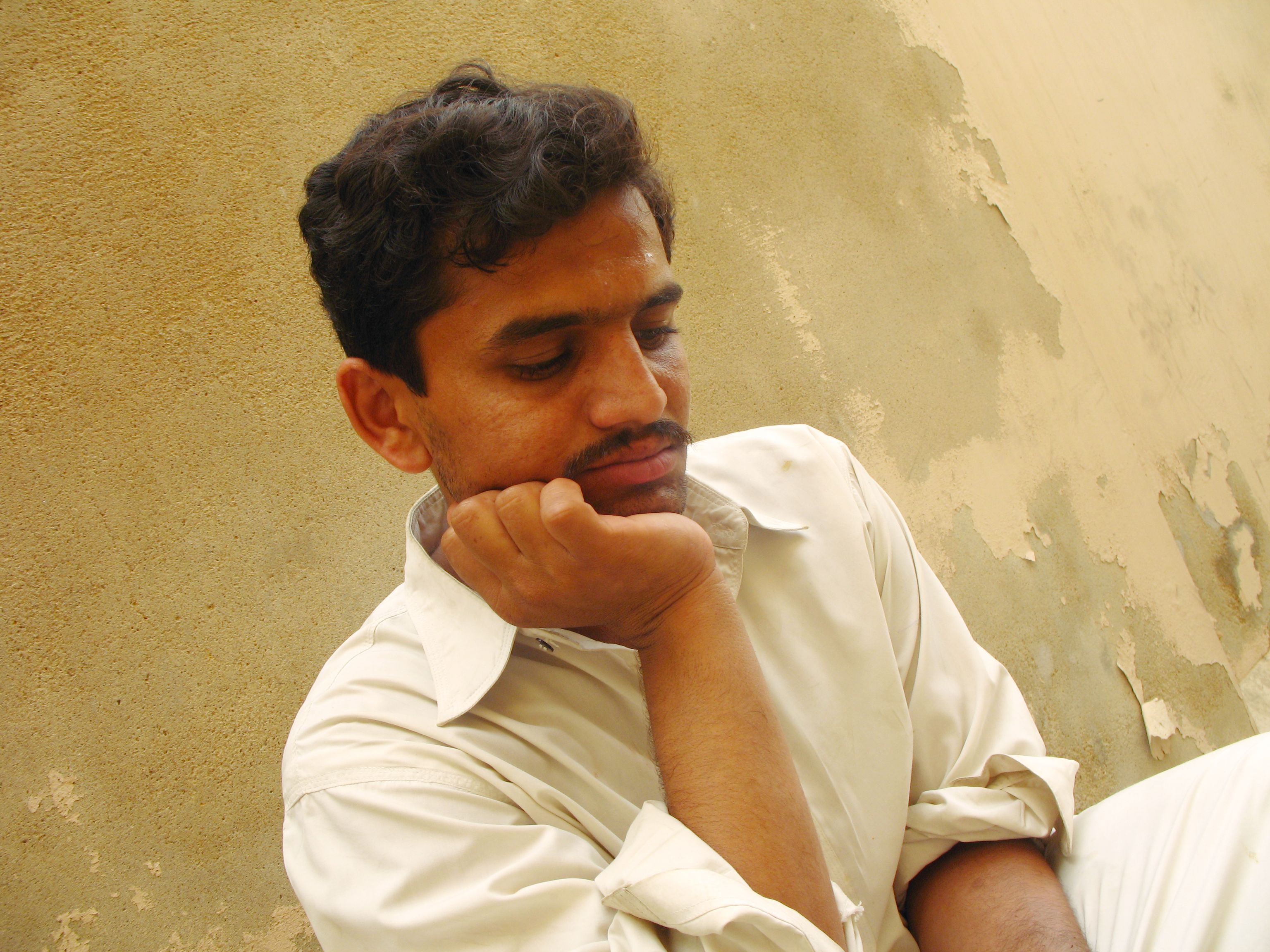 Worried sweating Asian man