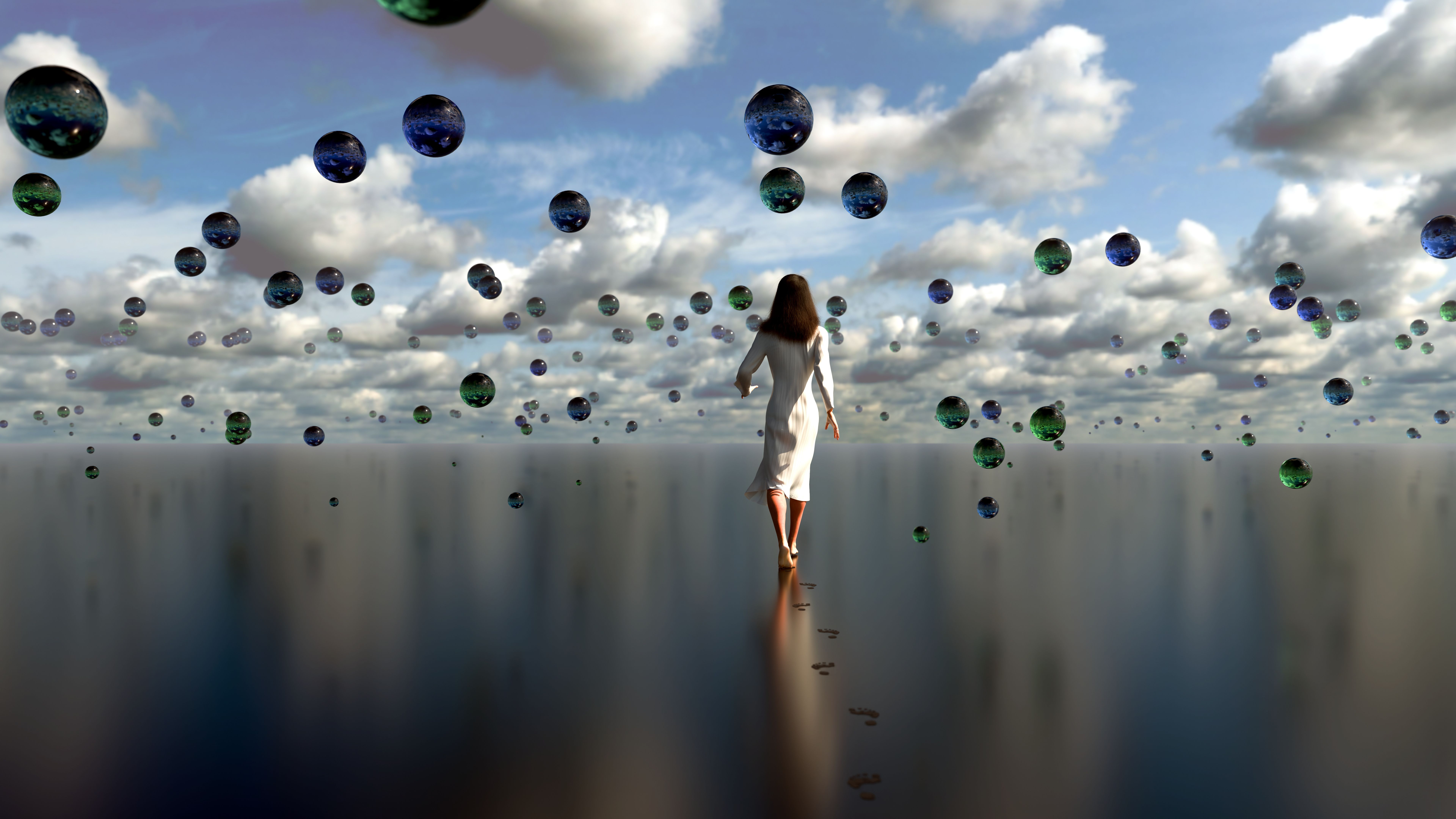 Barefoot woman wearing a white dress while walking away from the camera into a surreal infinite surface surrounding by green and blue floating orbs.