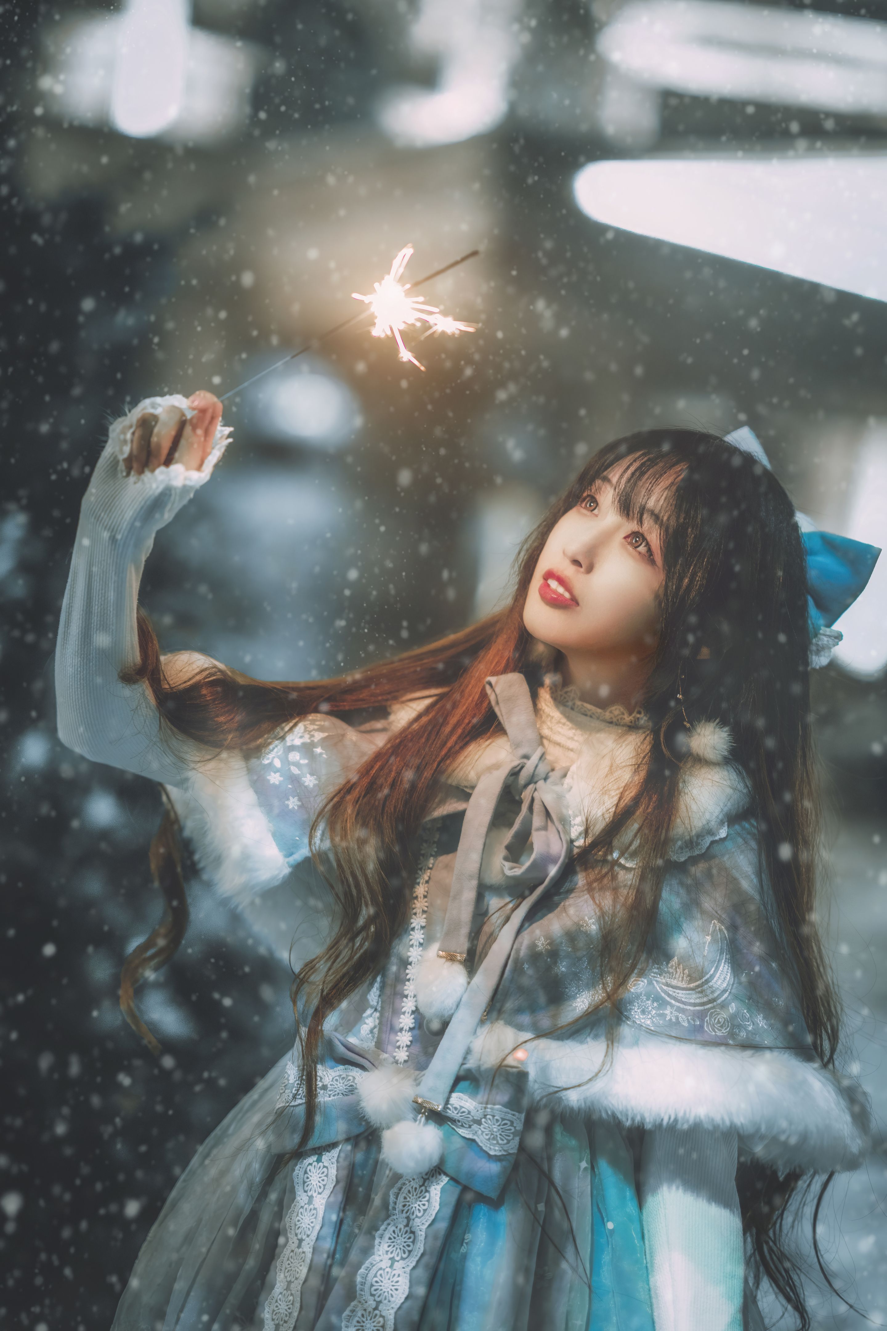 Portrait Of Young Woman With Arms Raised