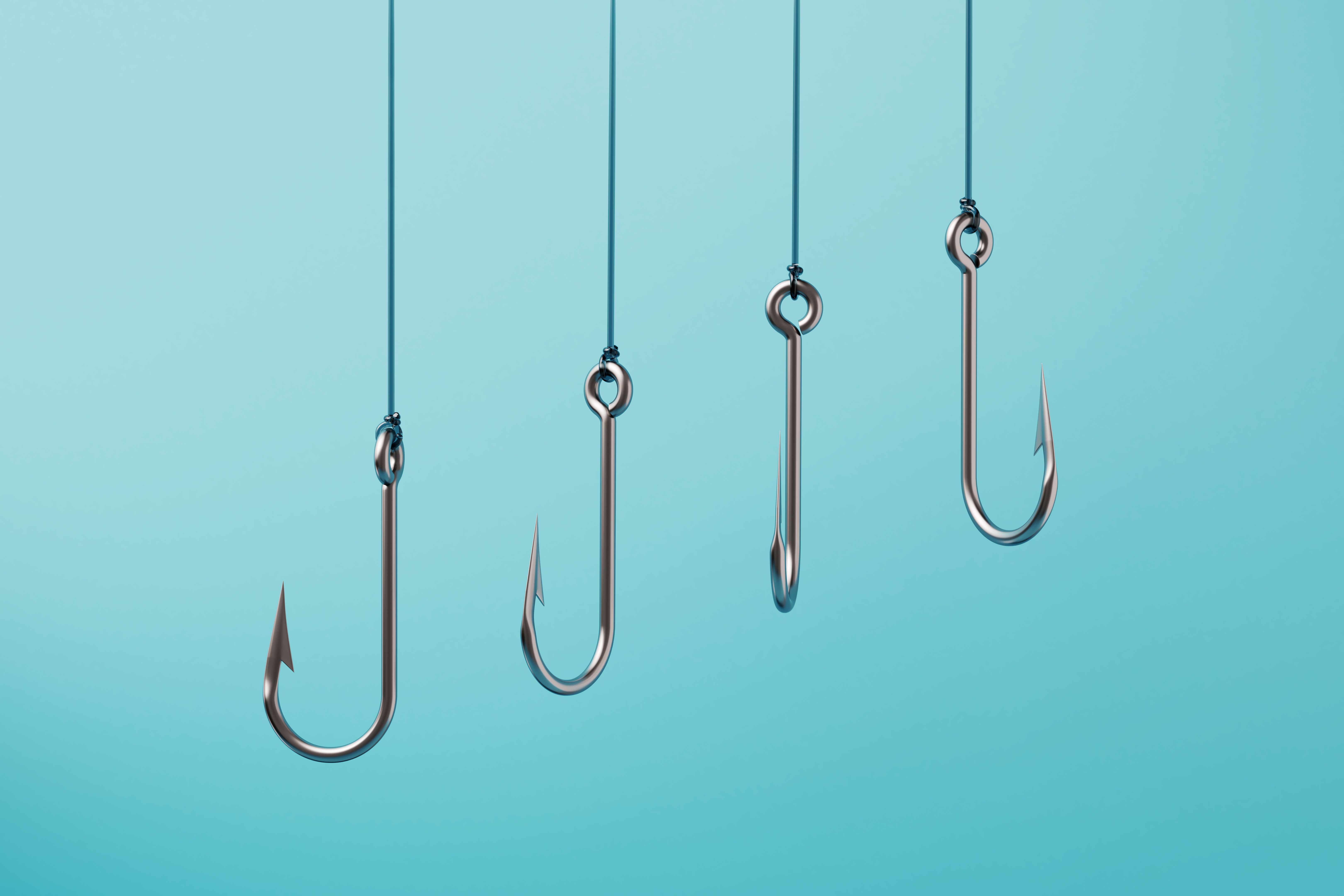 Fishing Hooks On Blue Background