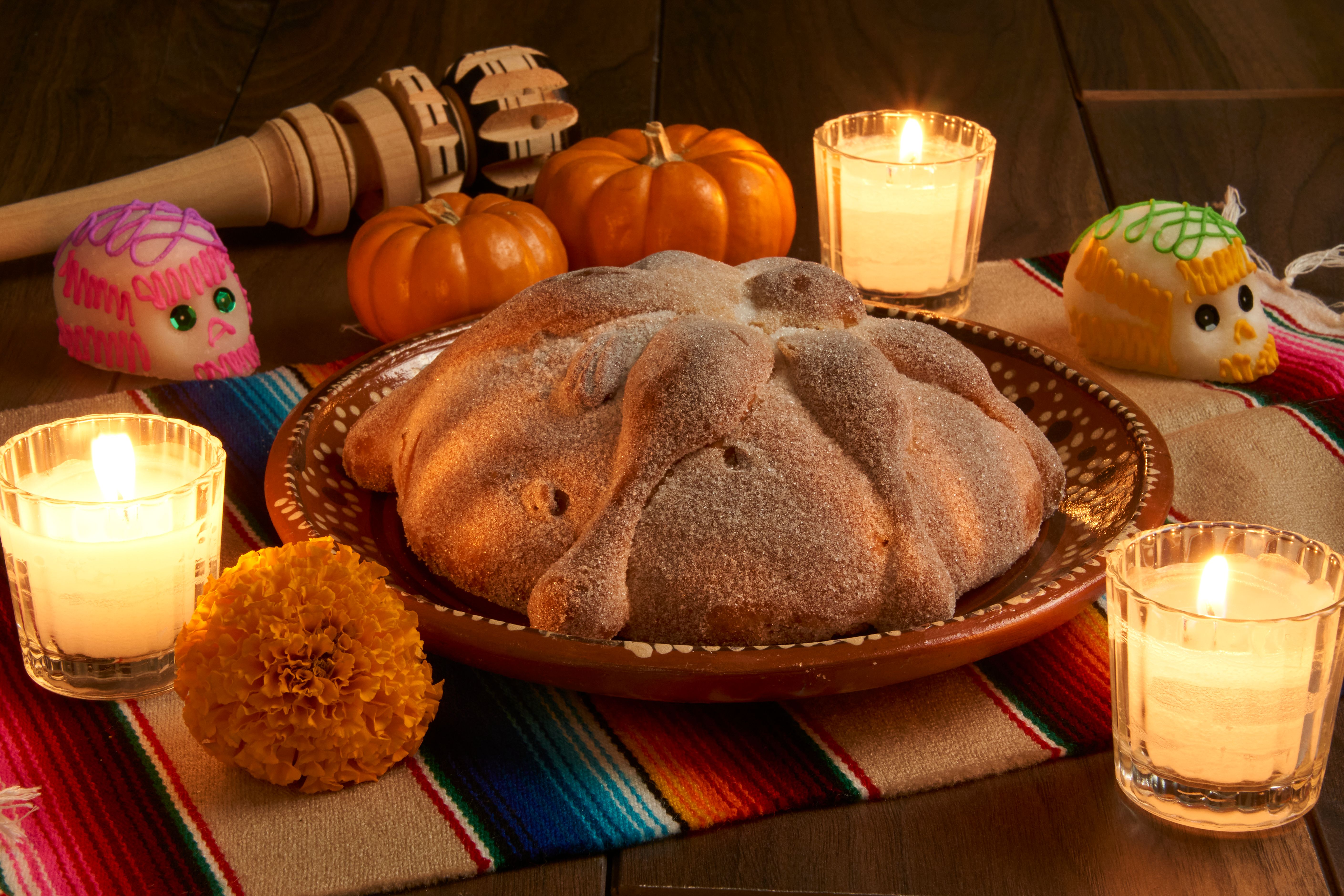 bread of the dead with candles for the altar of the day of the dead in mexico