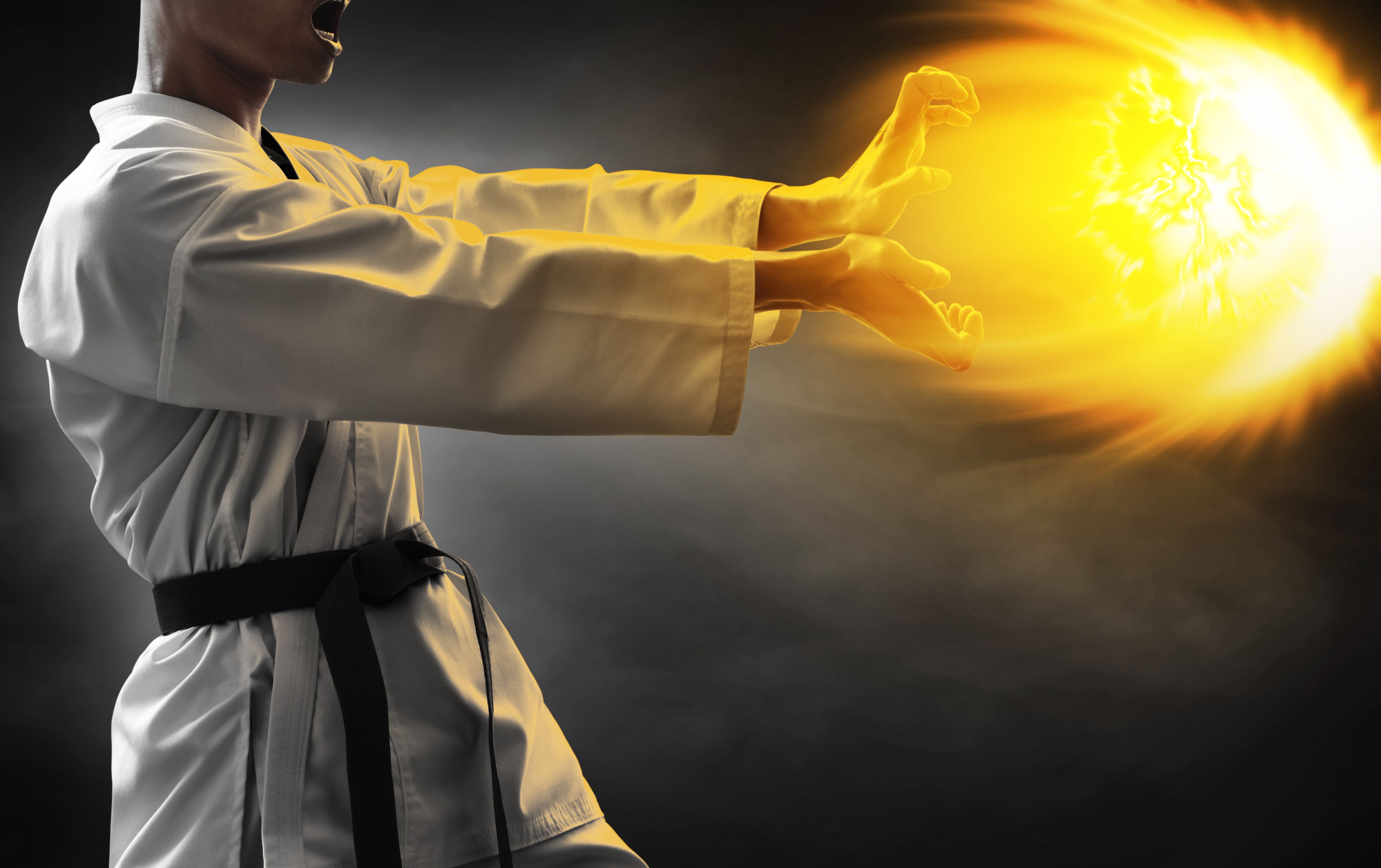 Karate martial arts fighter on dark background