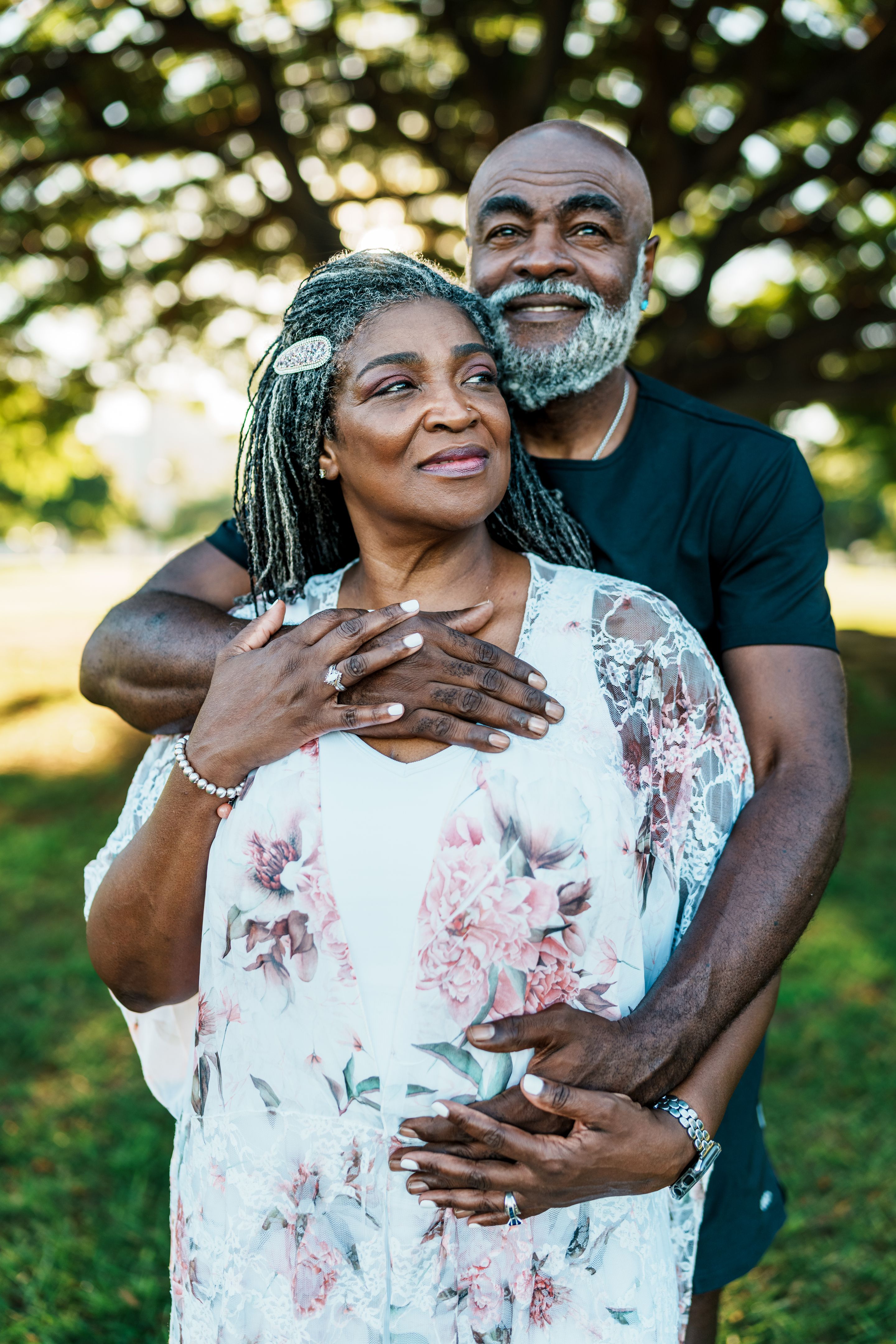 Portrait of affectionate senior couple savoring scenic view while on a walk