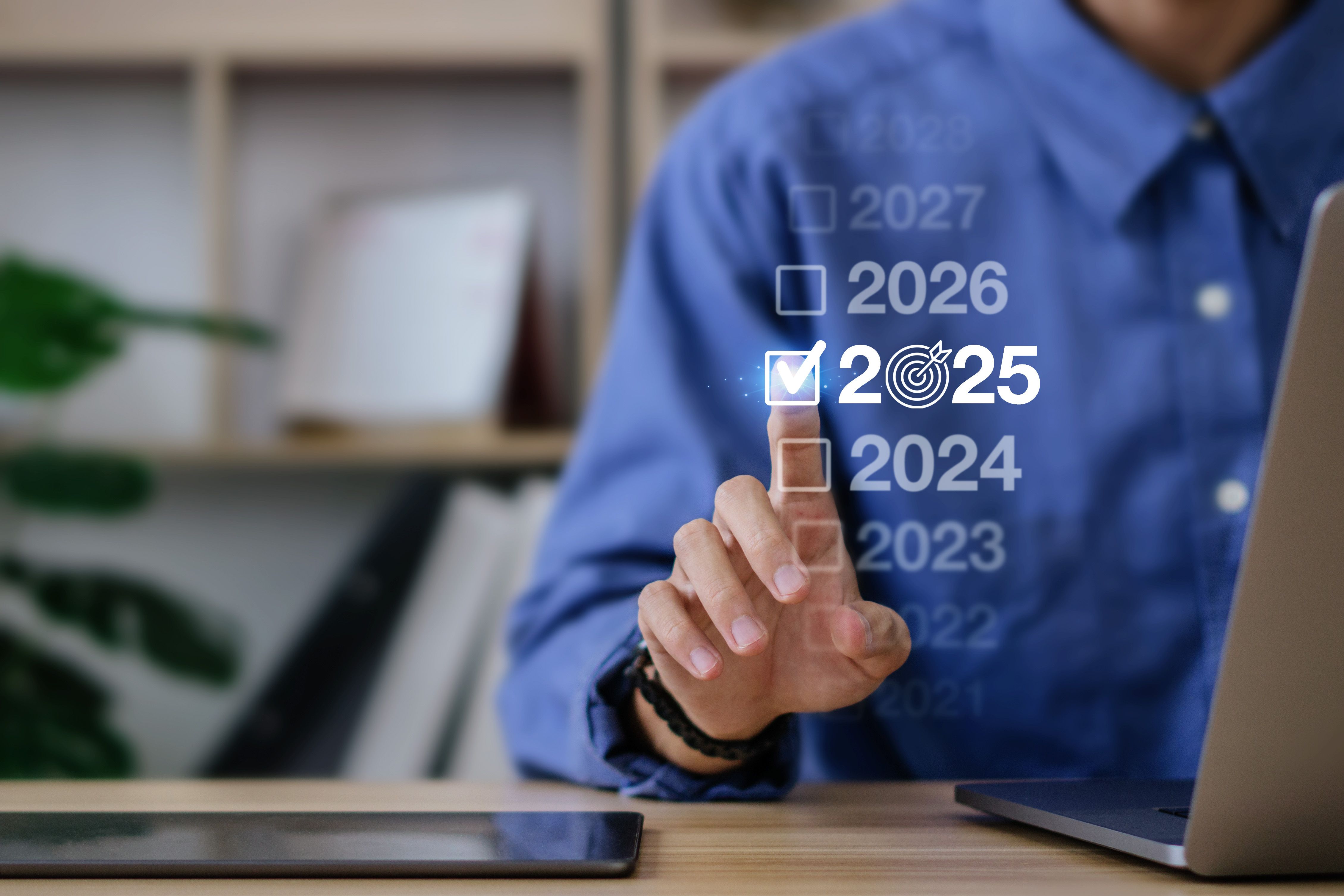 Businessman pointing on 2025. New Year Goals Action Plan. Business plan, finance, ai, future, teamwork, achieving goal. Concept of preparing for new year changes and start strategy idea.