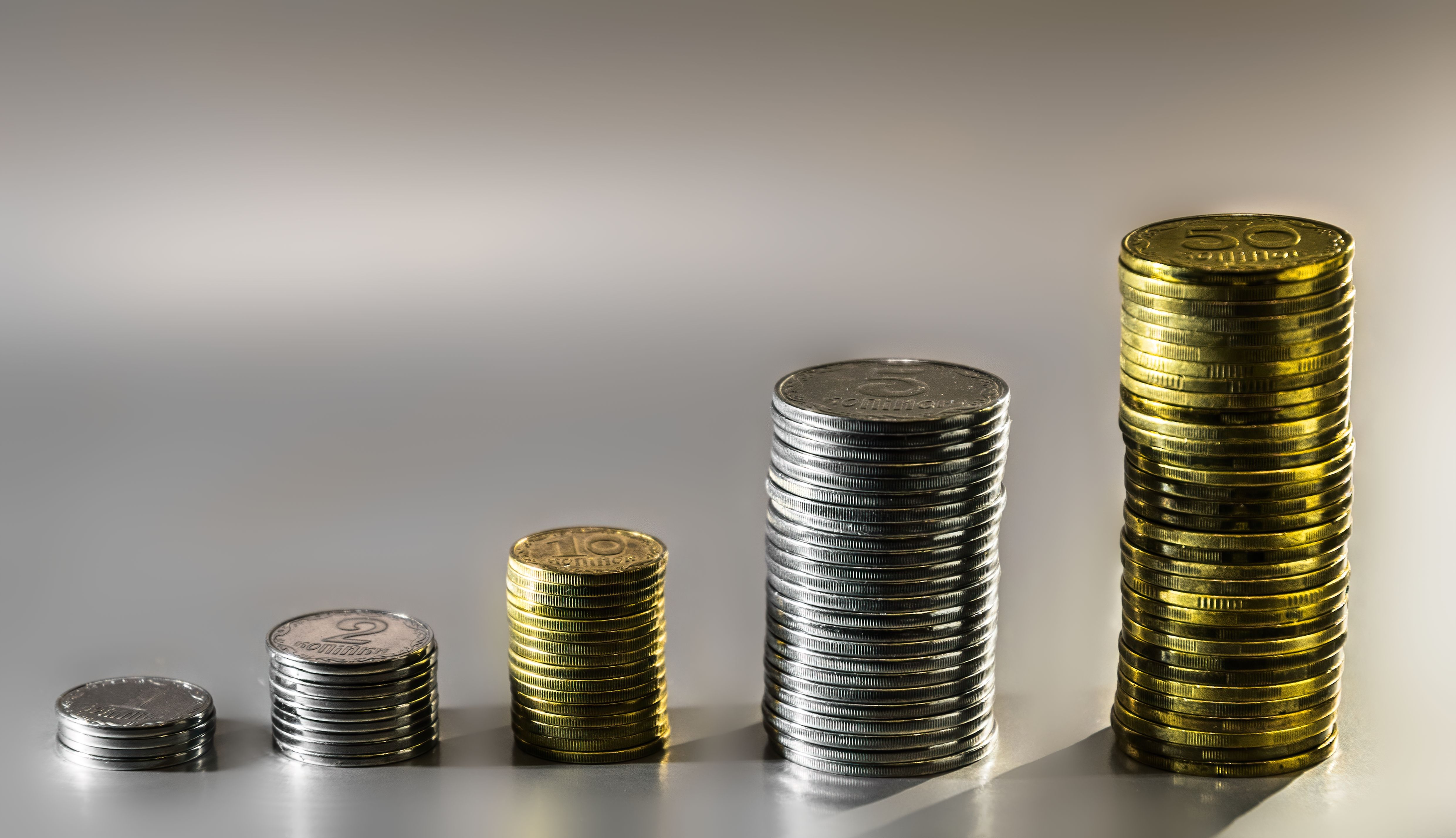 Stacks of nickel coins. Economic growth and recovery