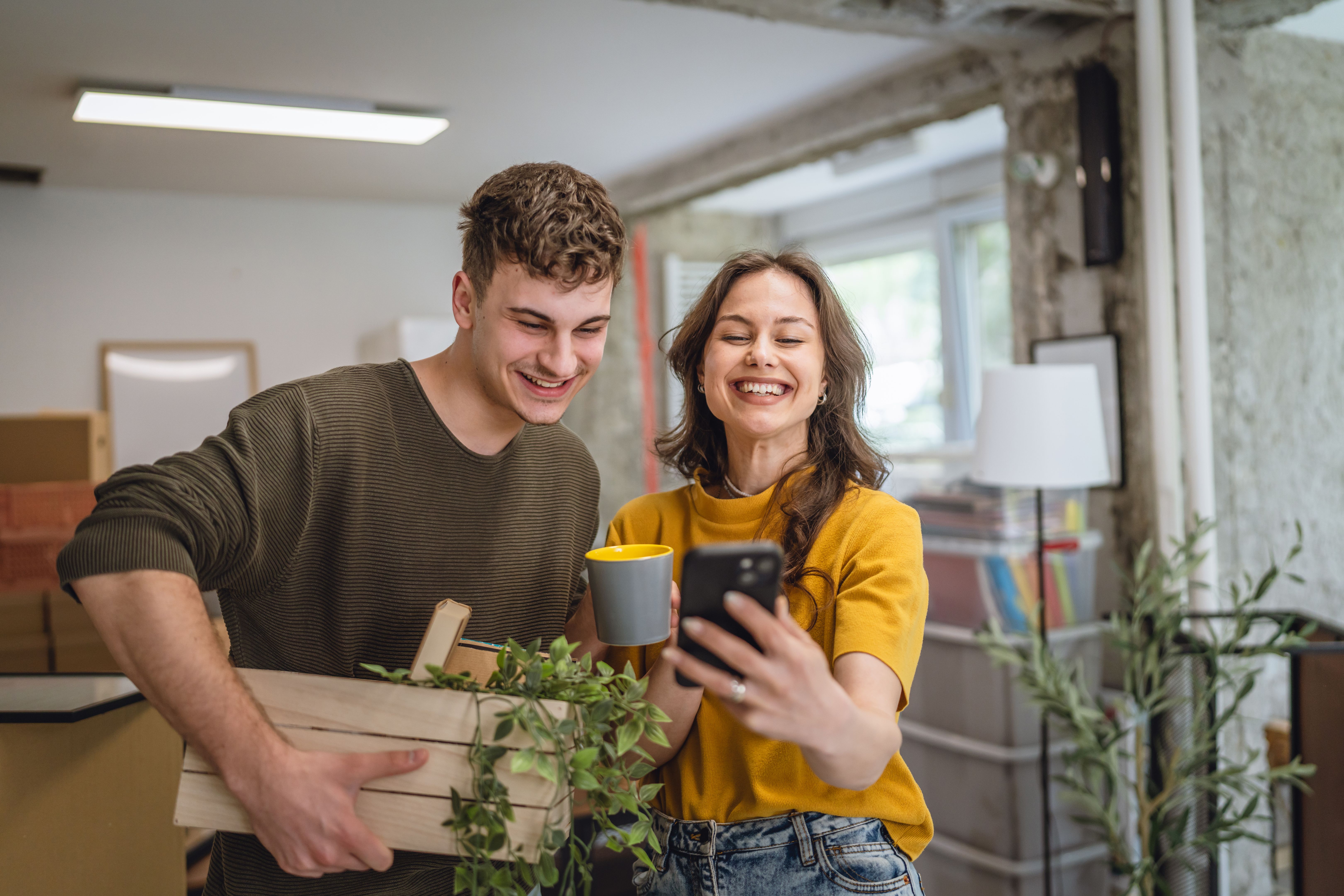 happy couple unpacking