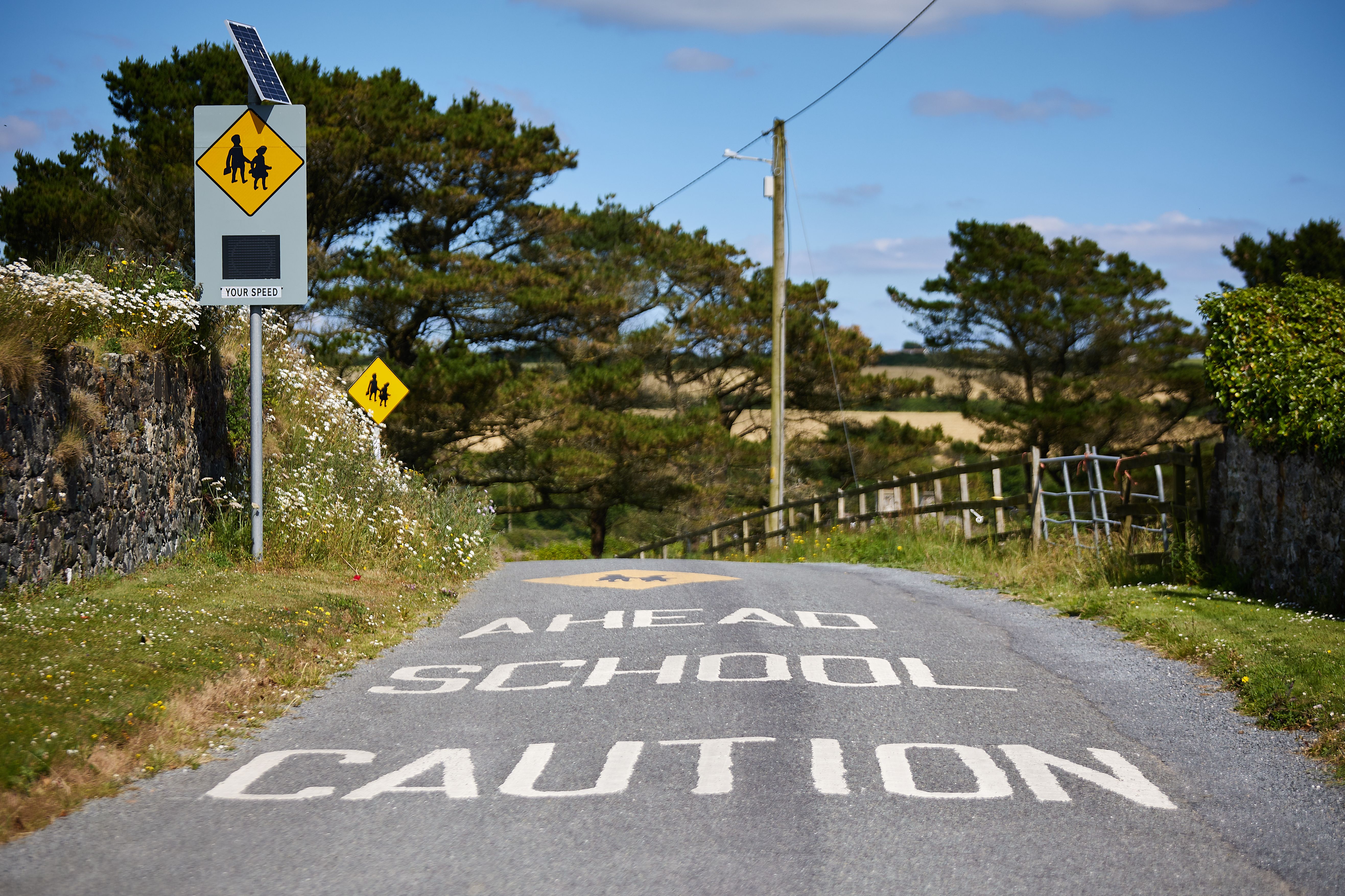 School zone warning sign on traffic School zone warning sign on traffic