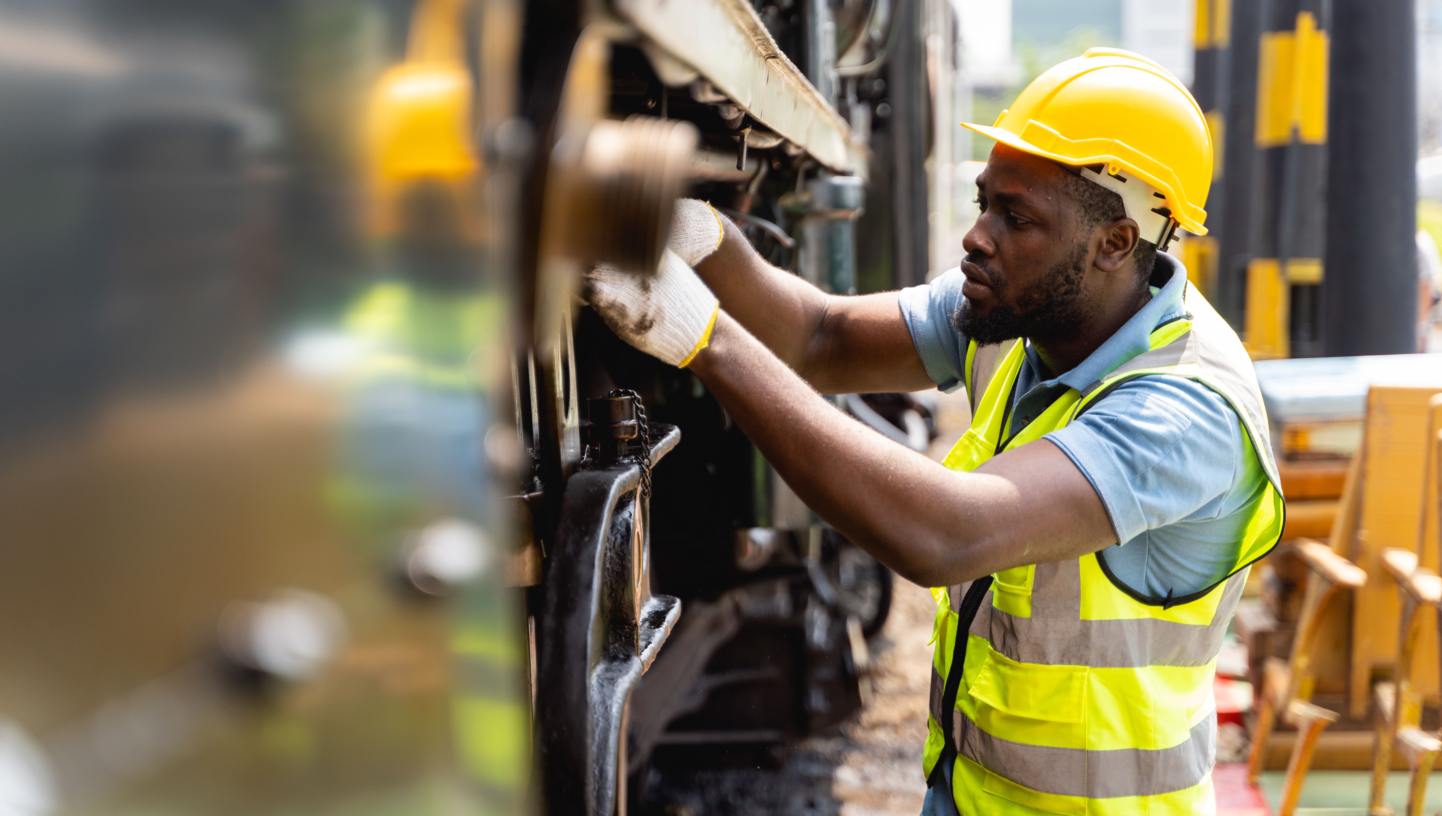mechanic inspecting equipment