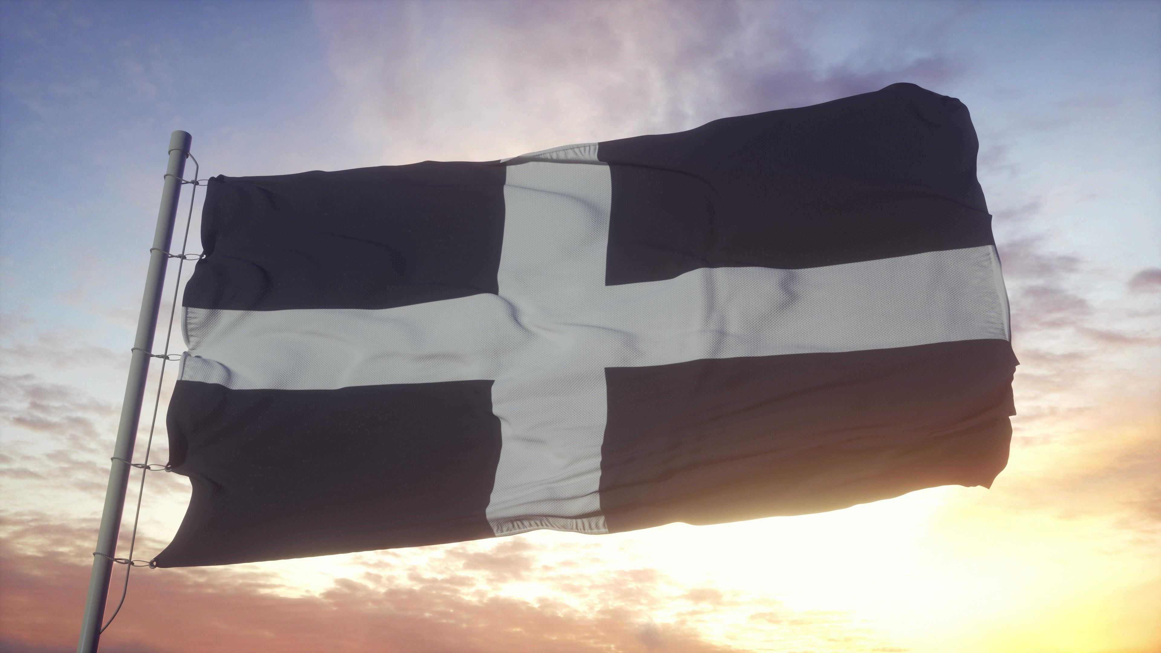 Cornwall flag, England, waving in the wind, sky and sun background. 3d rendering