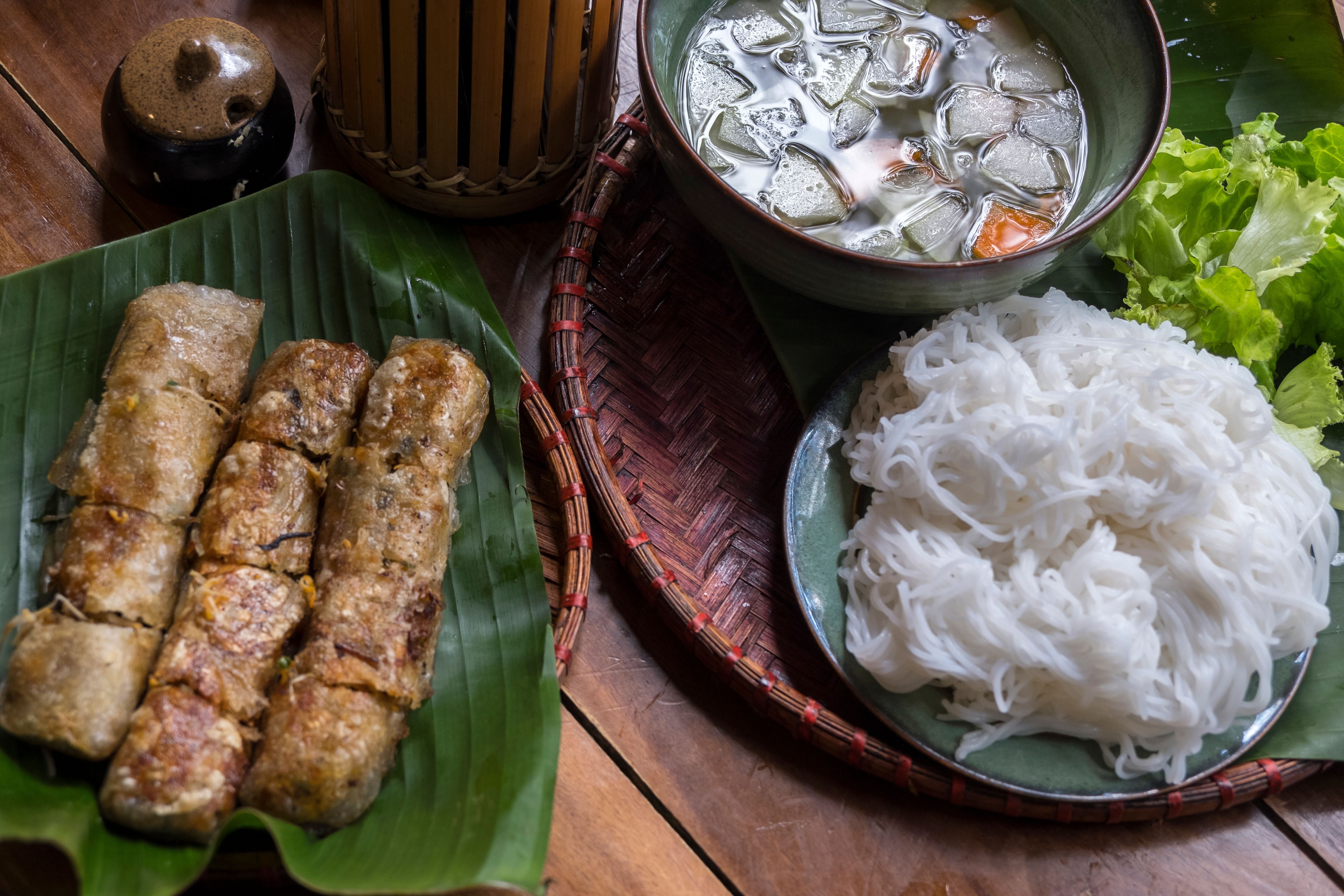Beef rolls, rice noodles and Vietnamese Pho Bo soup