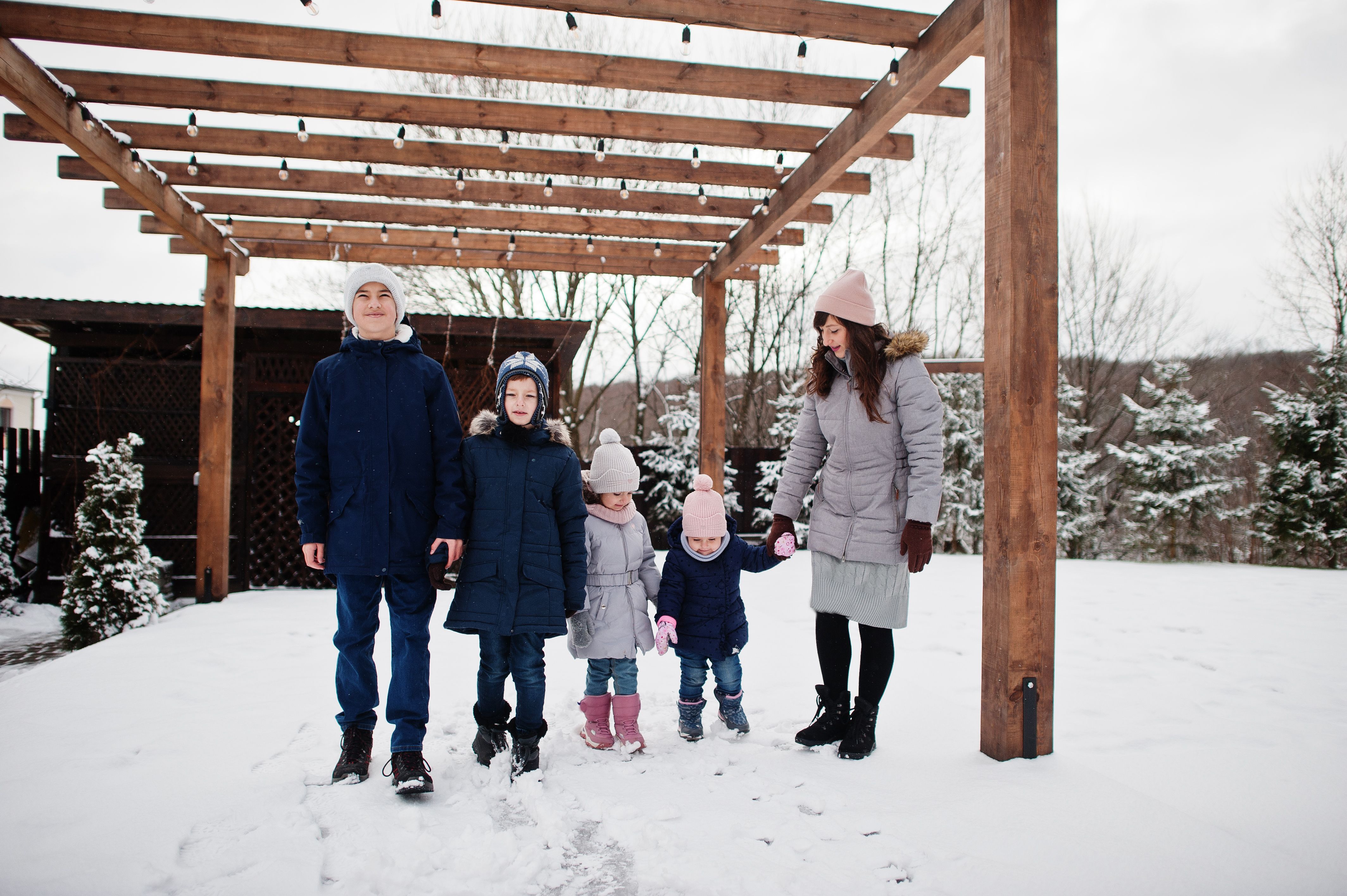 family enjoying pergola