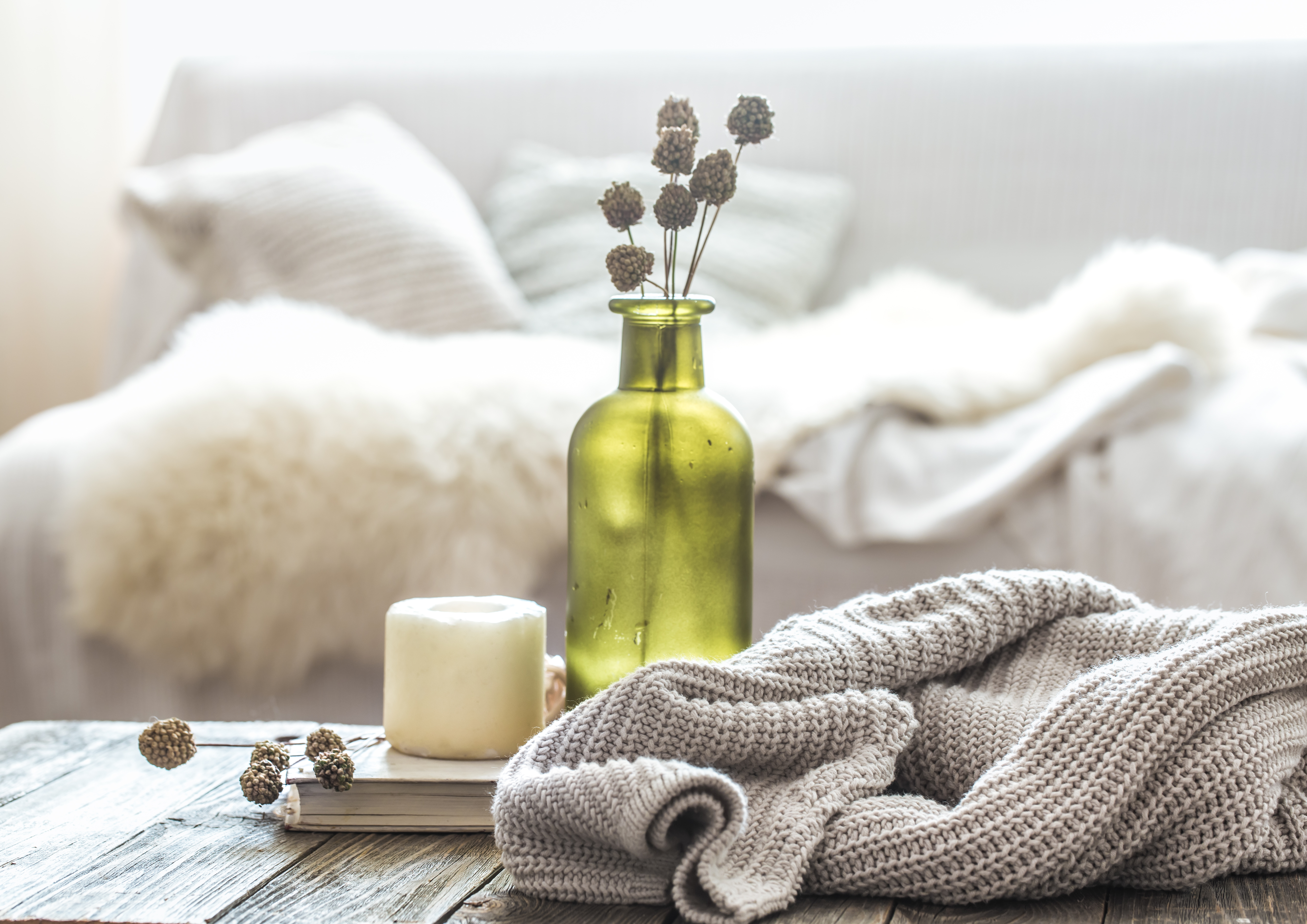 Still life home decor on a wooden table.