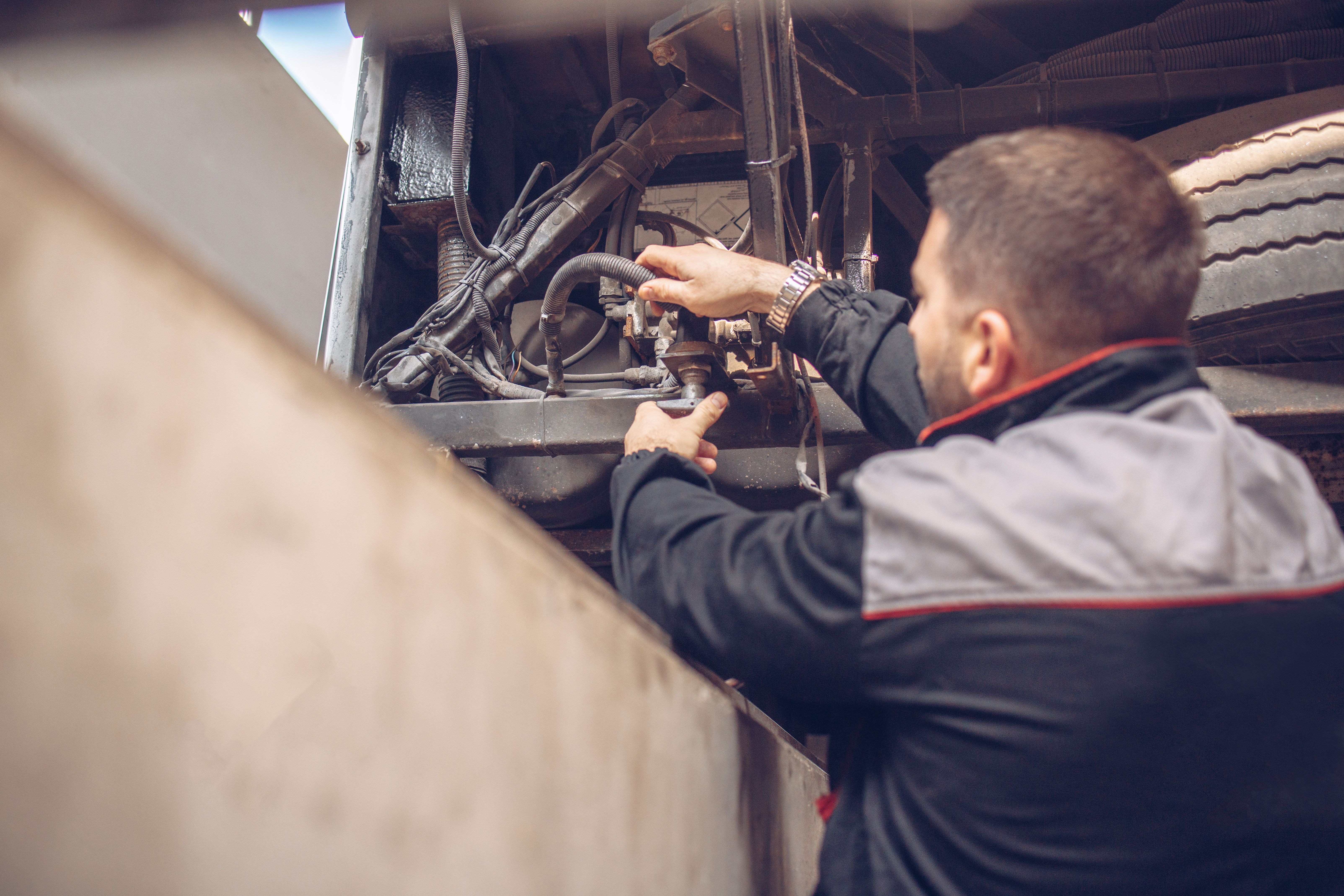 mechanic working on truck