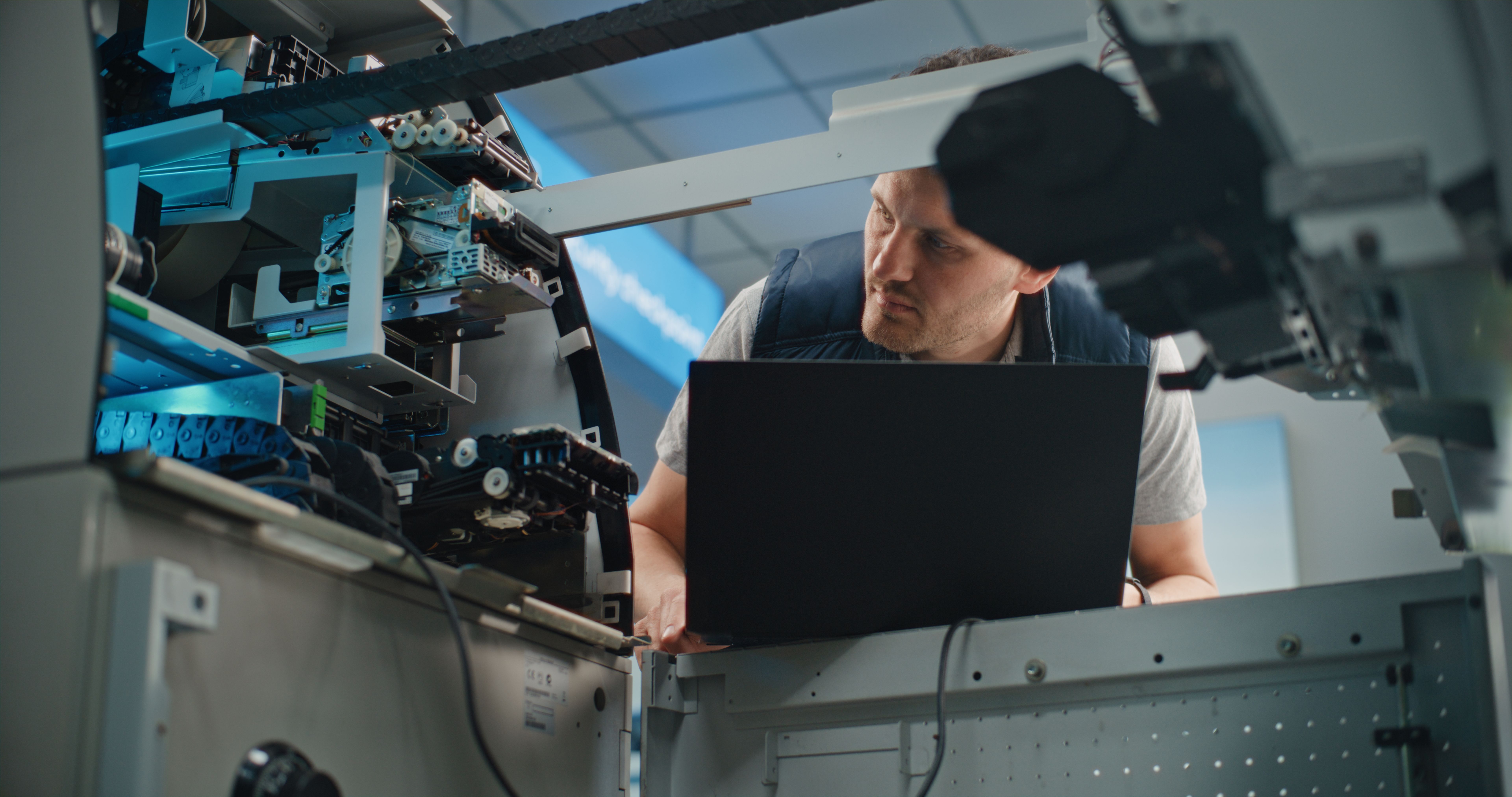 technician repairing computer