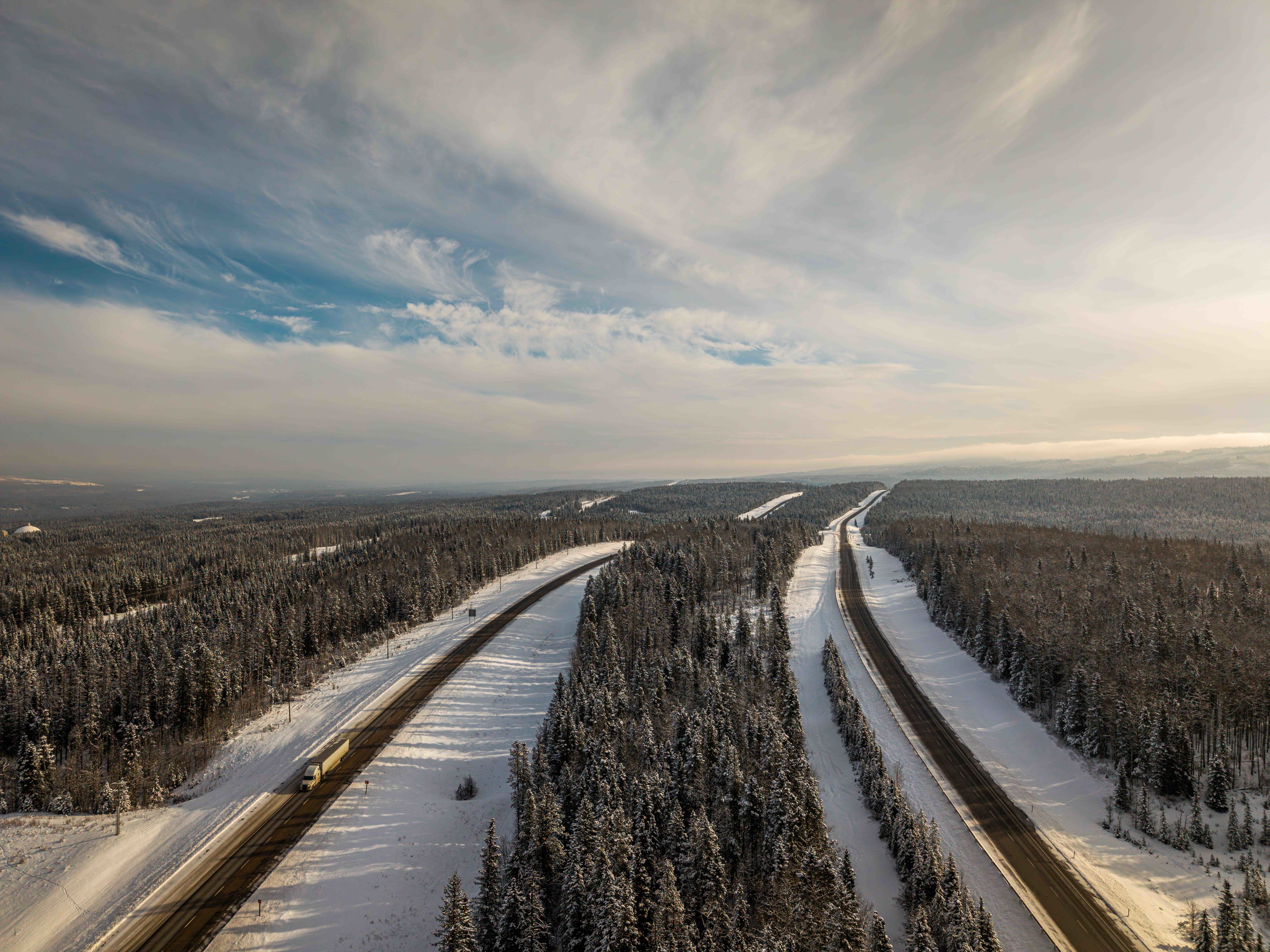 snowy road trucks