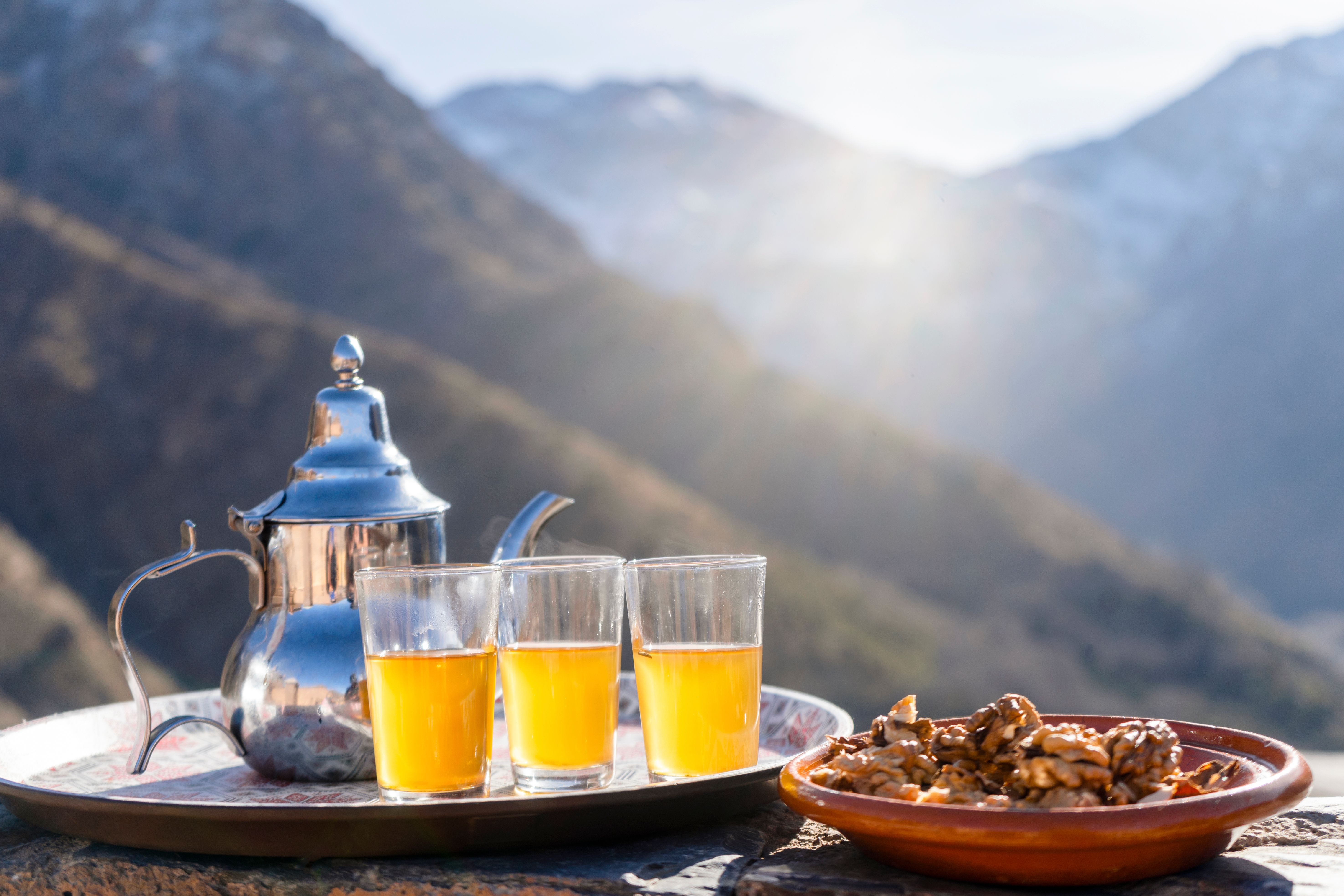 Famous Moroccan mint tea and silver kettle in High Atlas mountains,