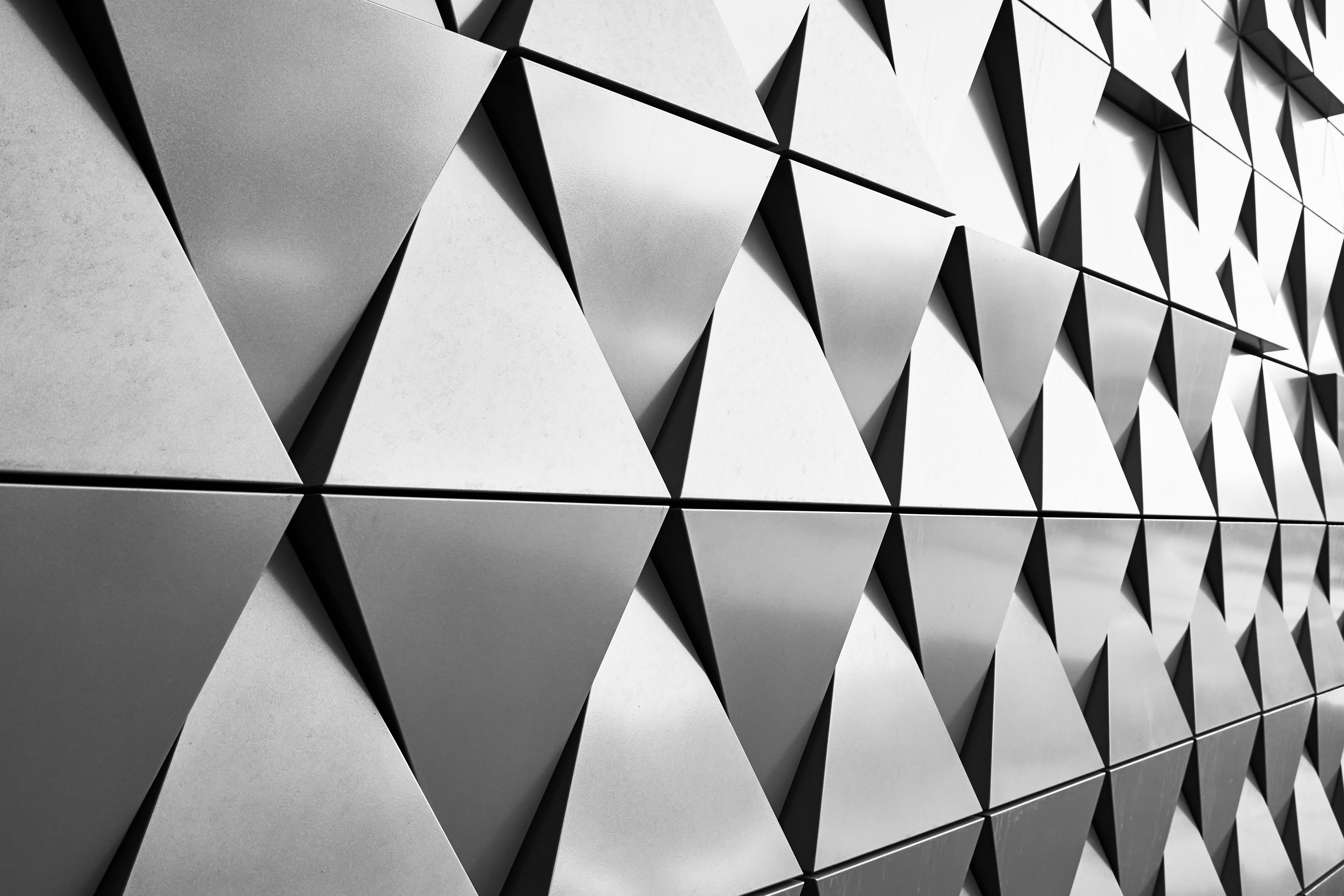 Abstract architecture detail. Gray wall facade with geometrical pattern