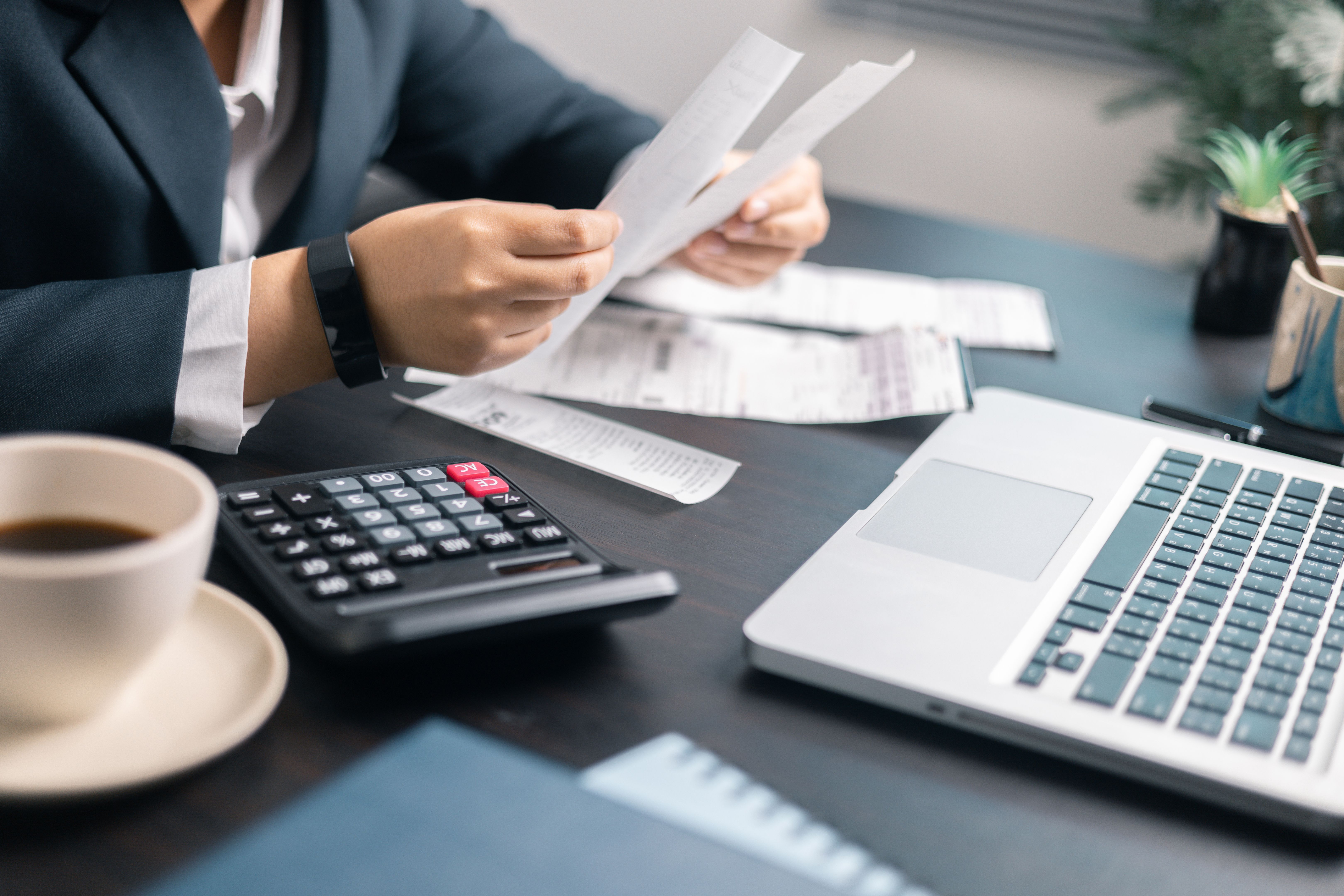 Finance bank tax expense accounting budget money businessman hand use Financial calculate accountant close up calculator with graph chart write office desk Business expense analysis saving home car Finance bank tax expense accounting budget money businessman hand use Financial calculate accountant close up calculator with graph chart write office desk Business expense analysis saving home car