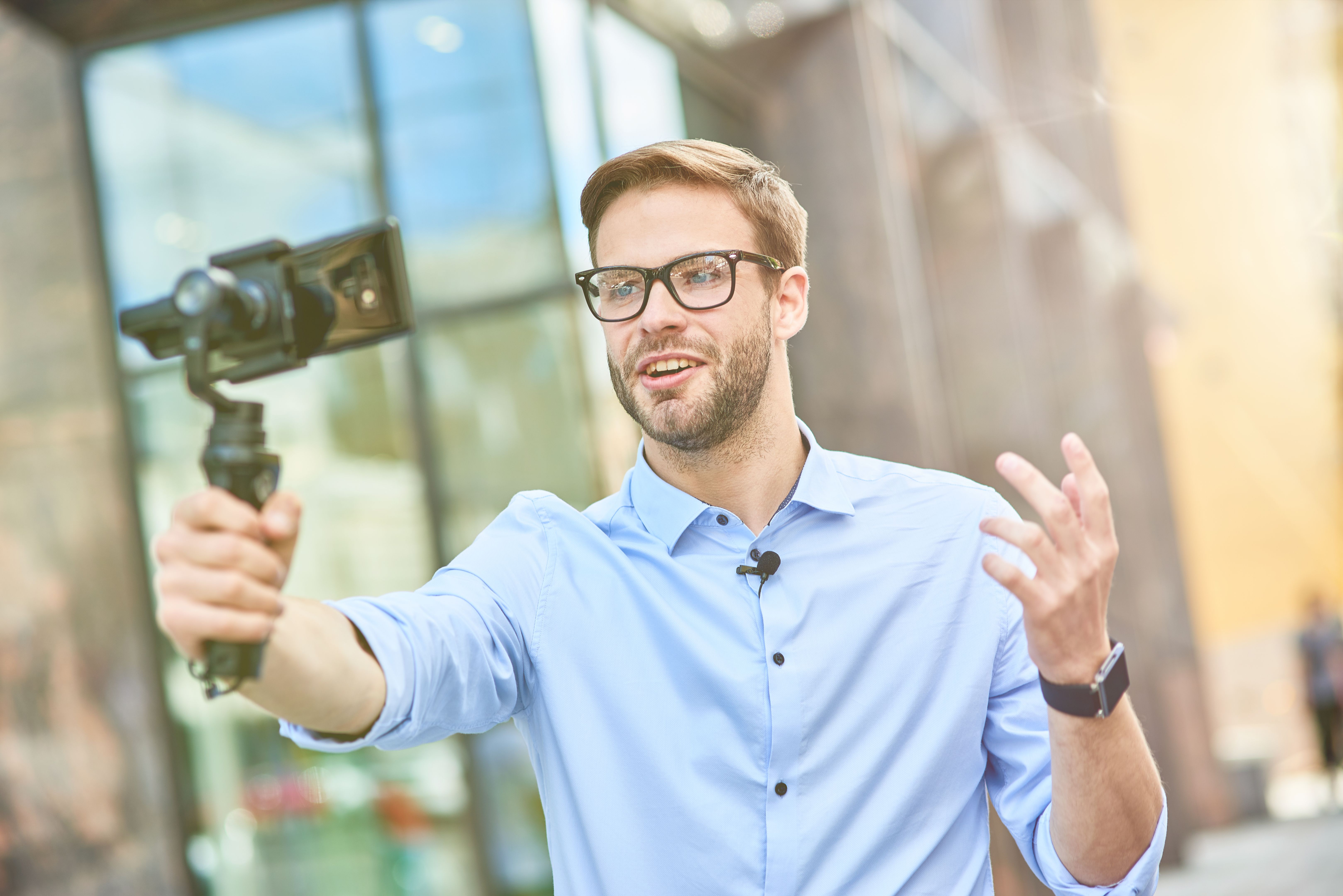vlogger recording video