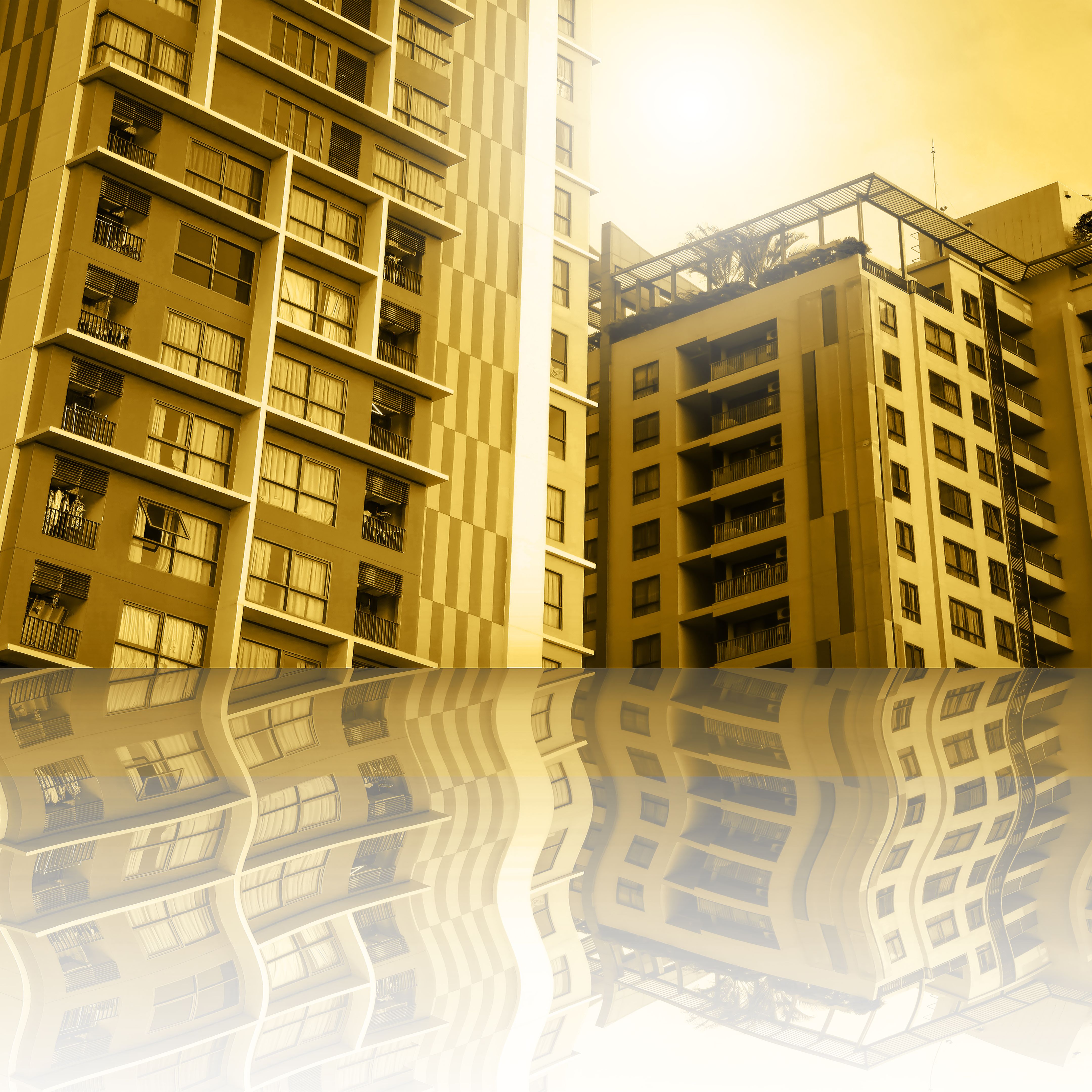 The modern condo building and reflection shadow background