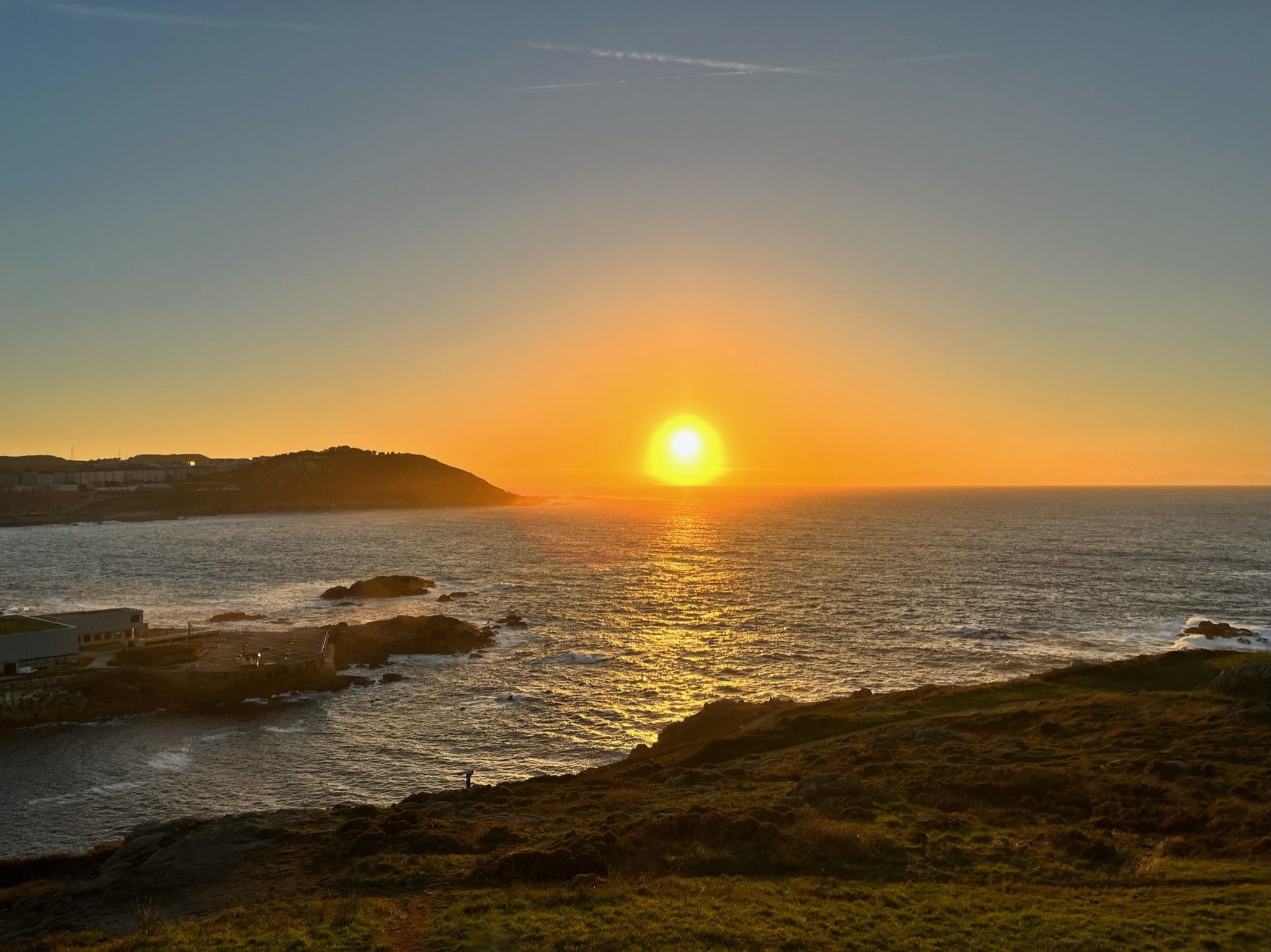 Golden Sunset Over Coastal Landscape