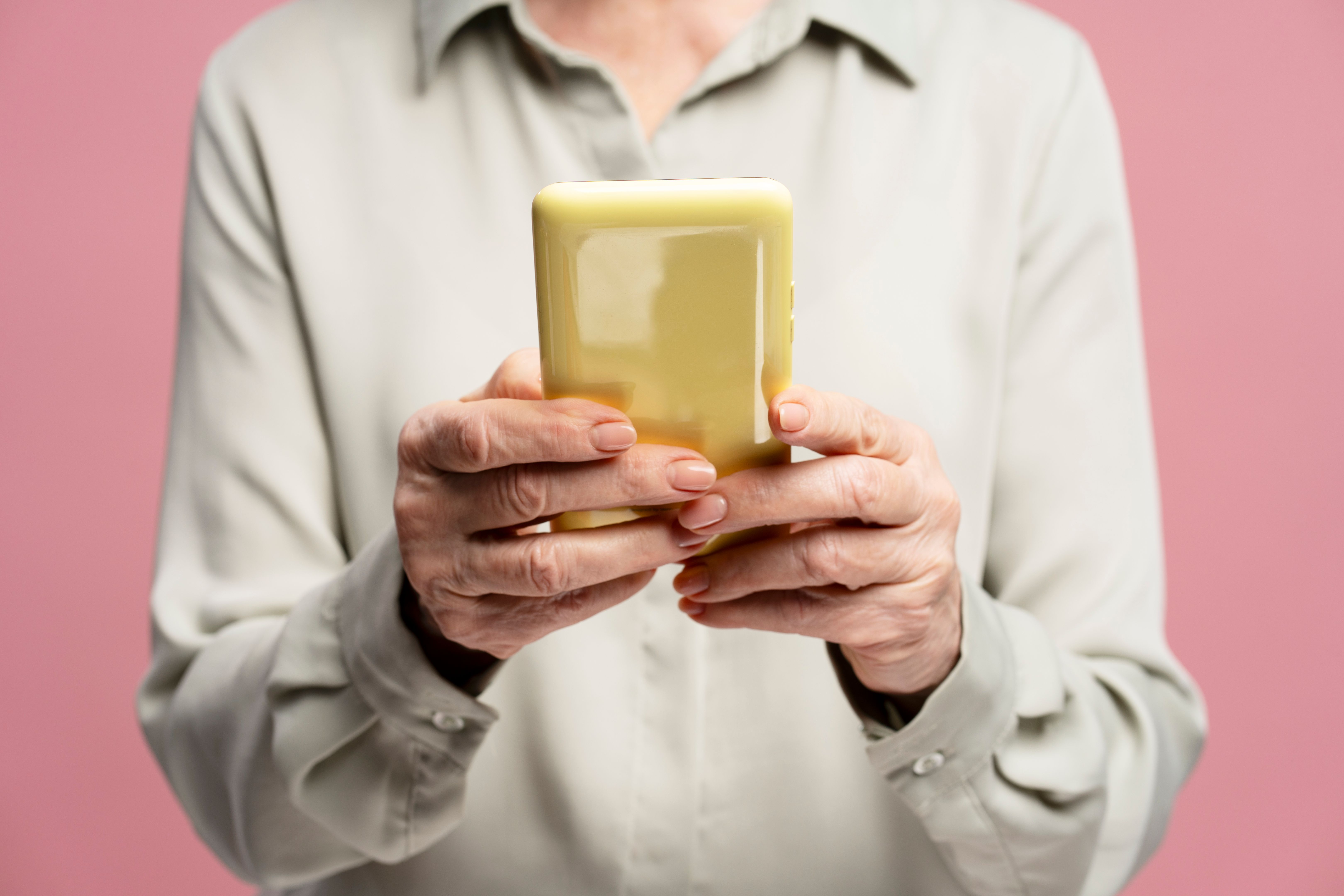 senior using smartphone