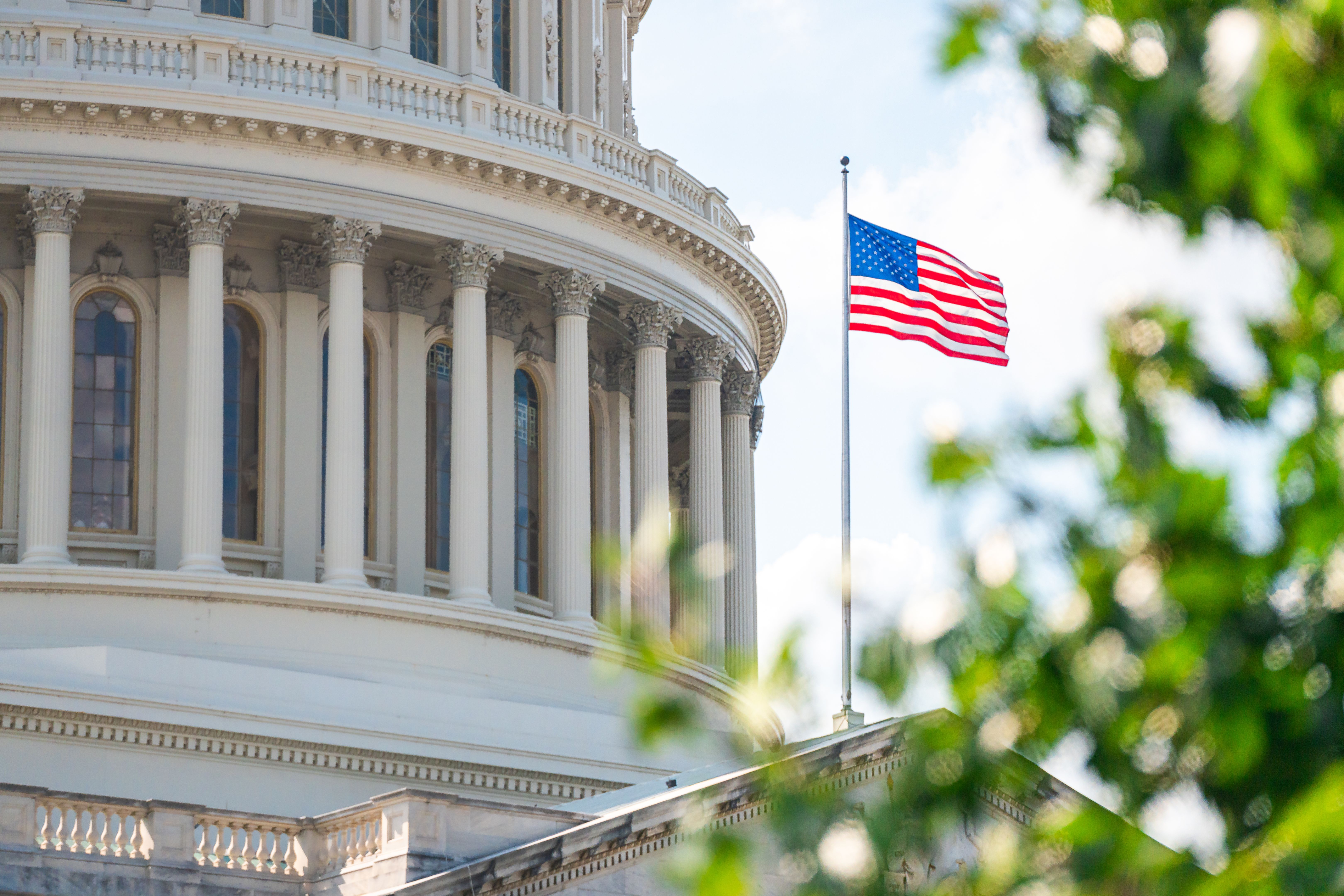 Close-up view of the American Flag on the U.S. Capitol building in Washington D.C. on the East Facade