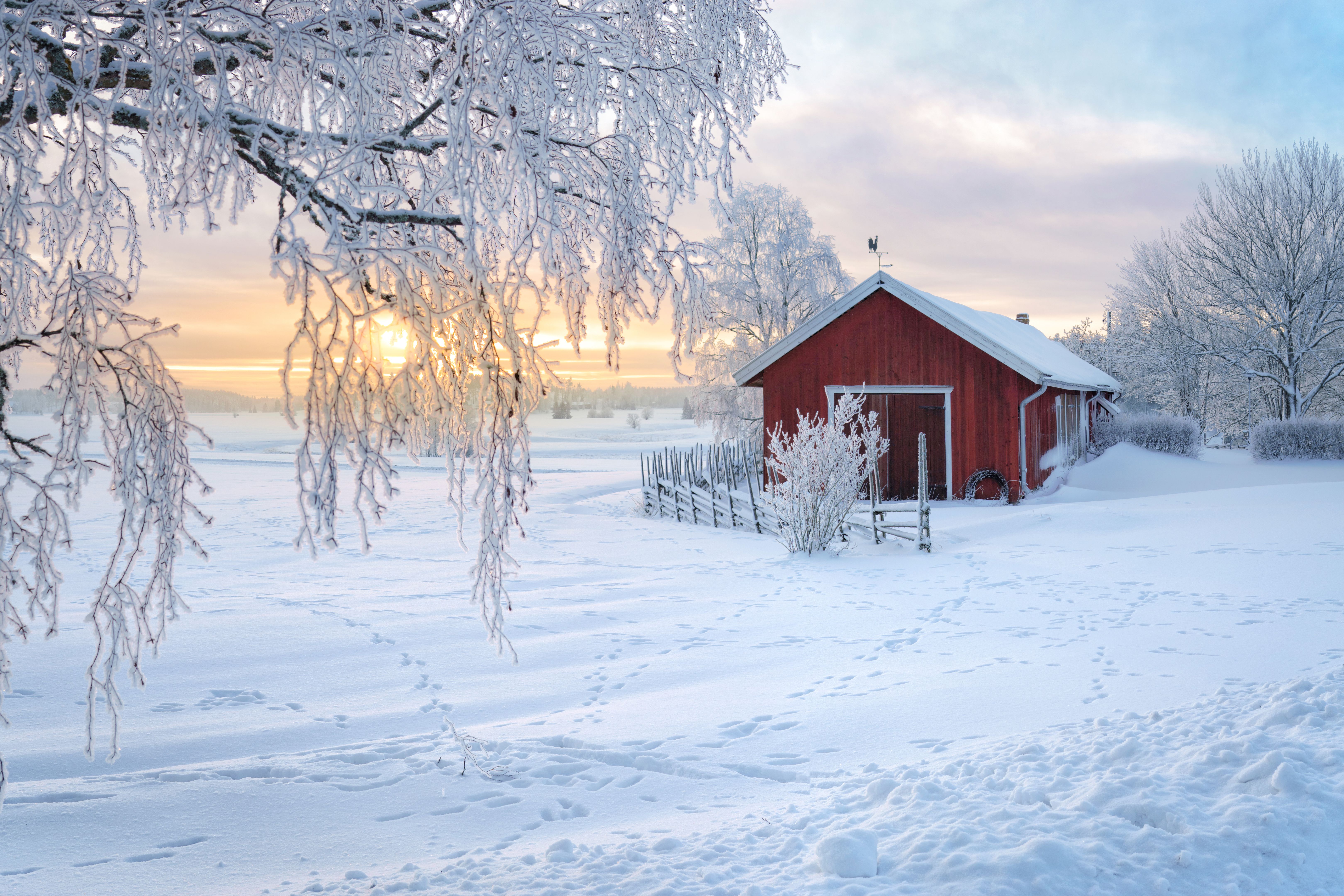 Winter view of a red barn