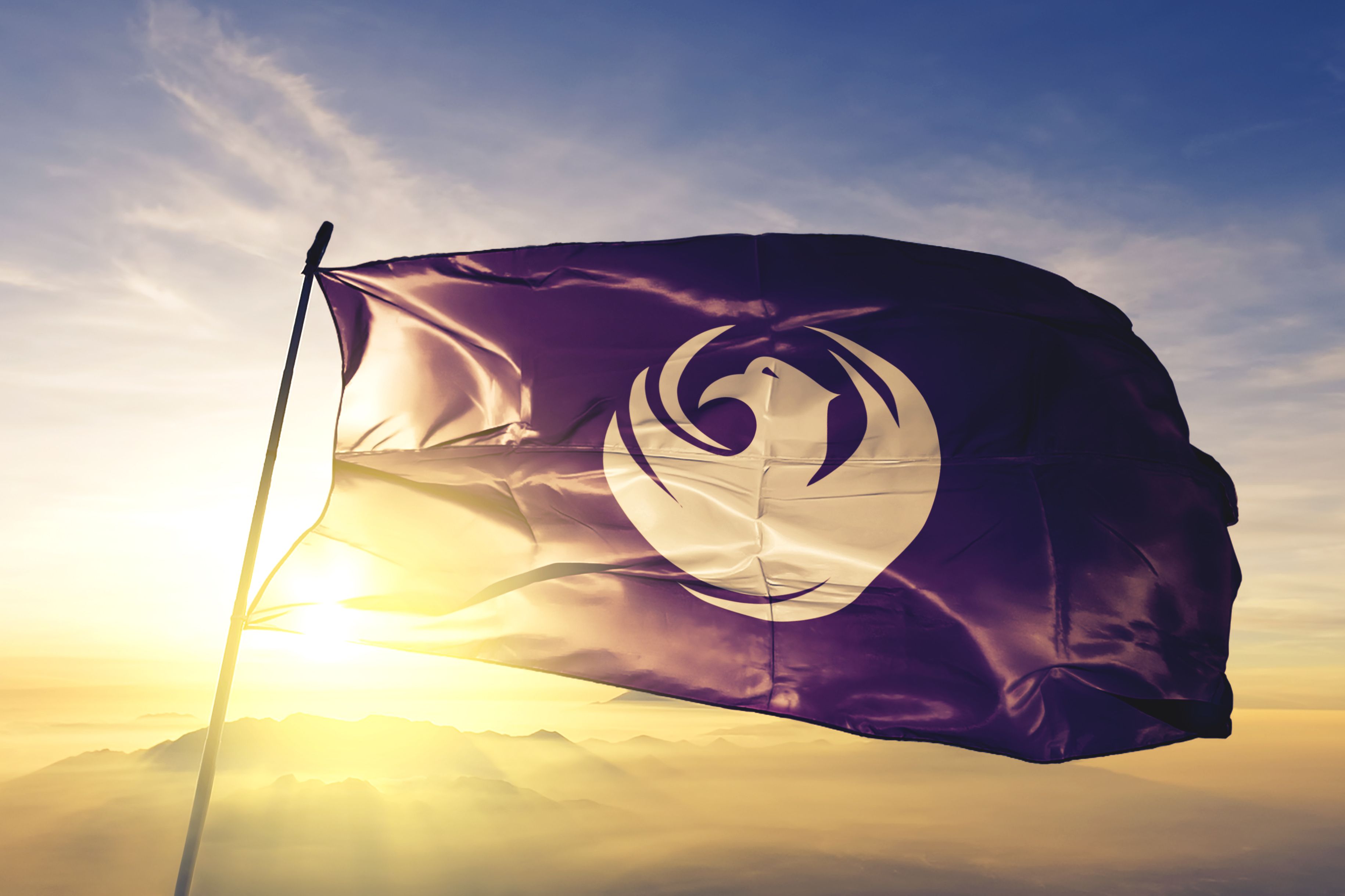 Phoenix city capital of Arizona of United States flag textile cloth fabric waving on the top sunrise mist fog