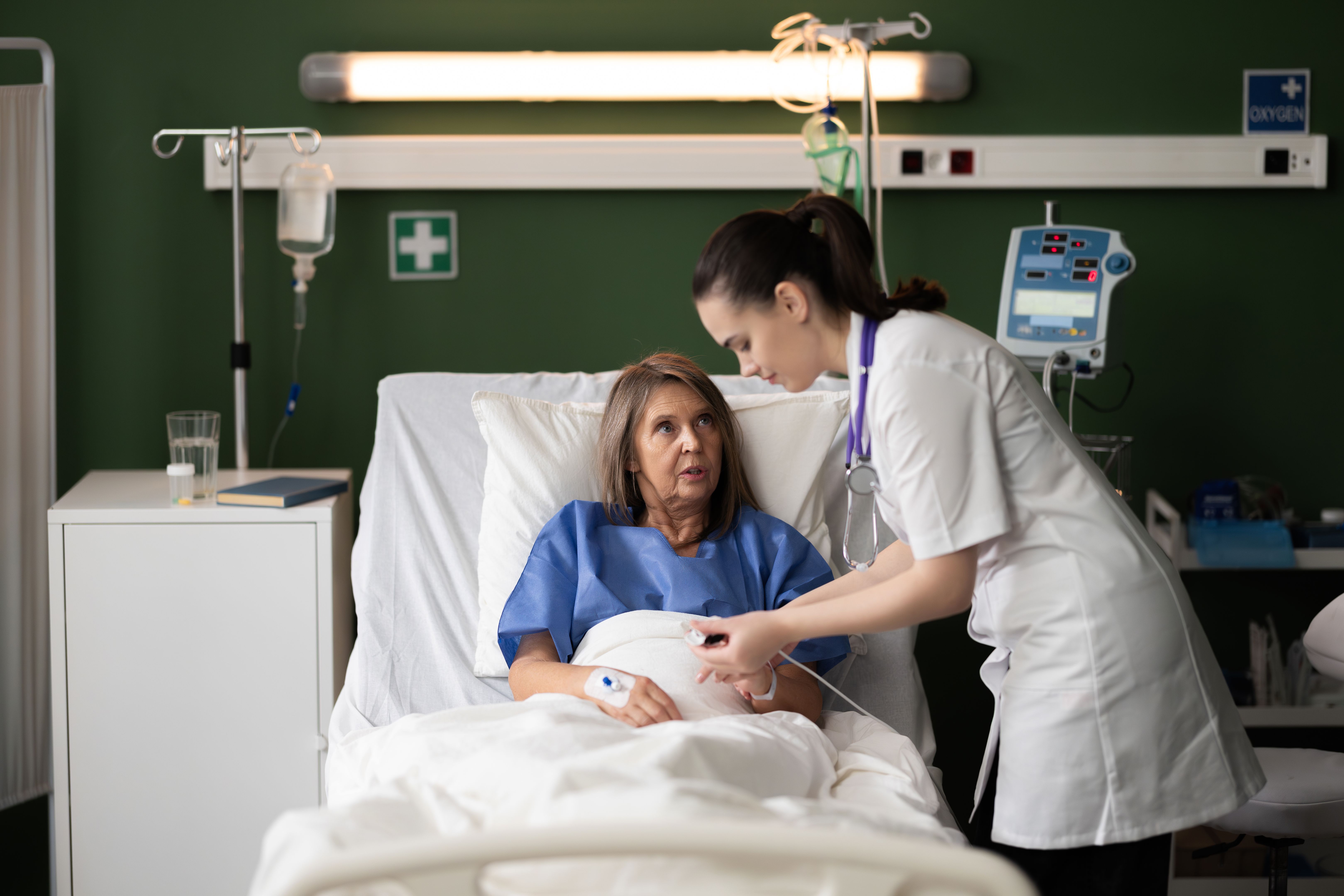 nurse helping patient