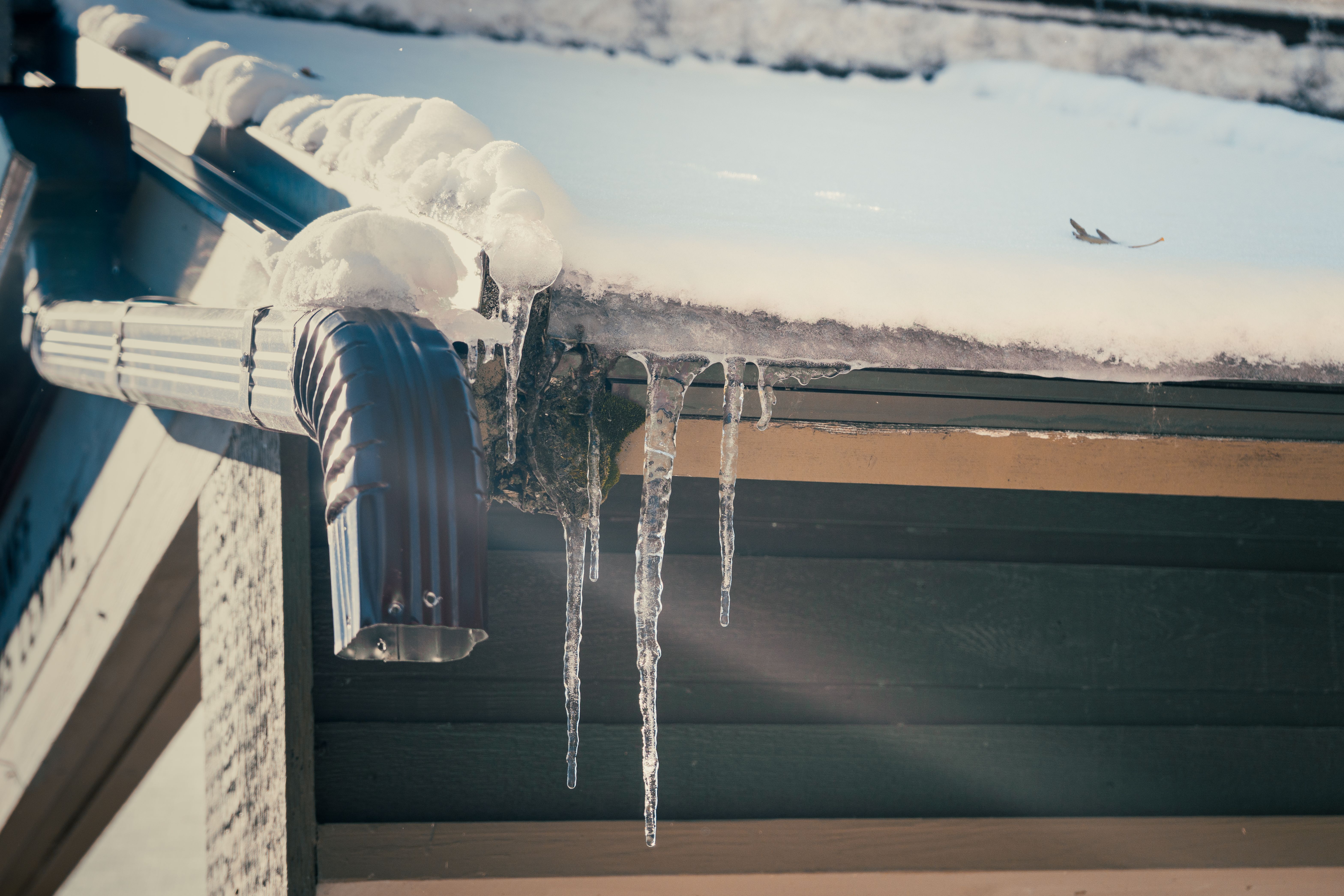 Poor Draining Gutter Installation in Clarksburg WV Allowing Ice build up Poor Draining Gutter Installation in Clarksburg WV Allowing Ice build up