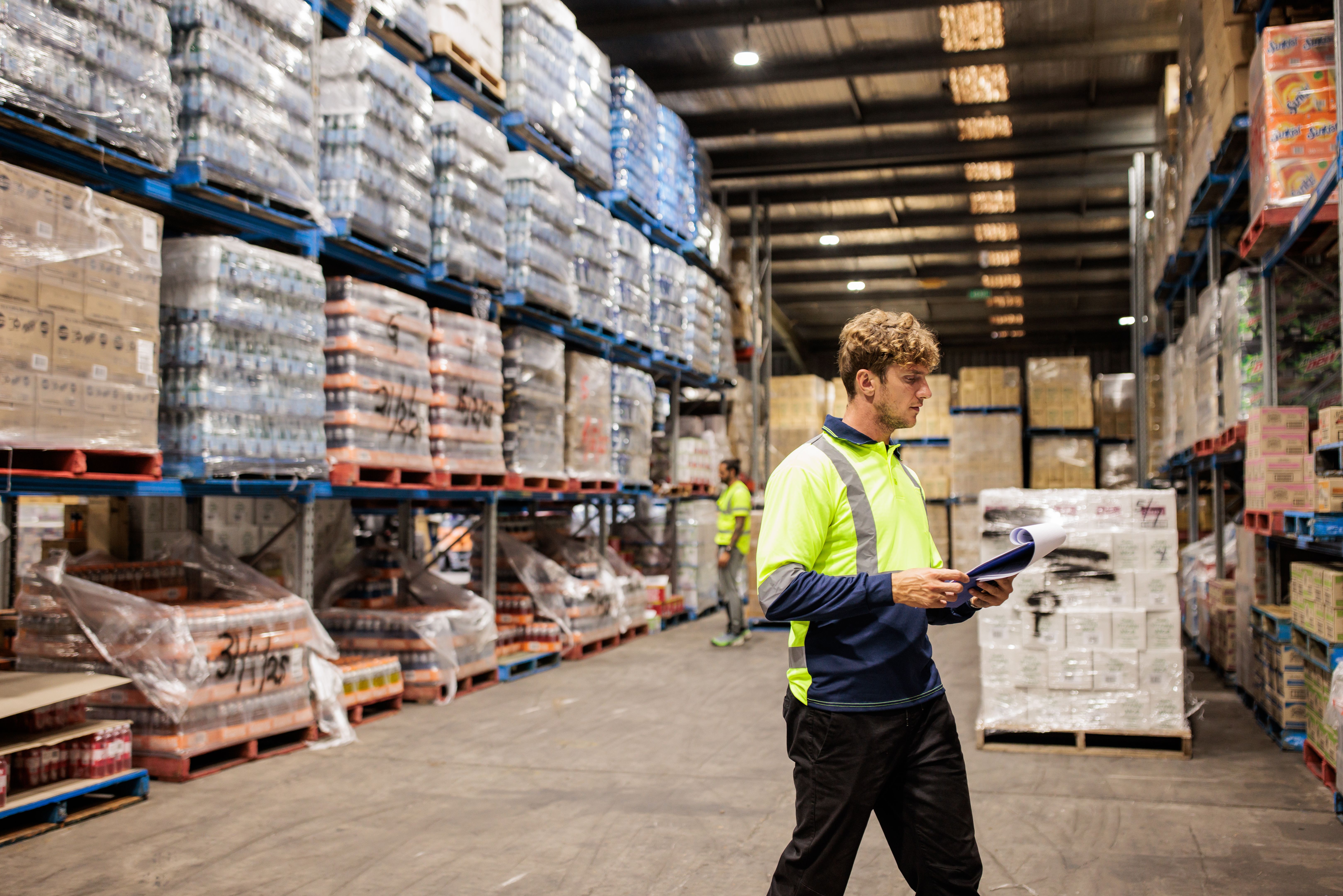 Warehouse Worker Conducting Inventory Check